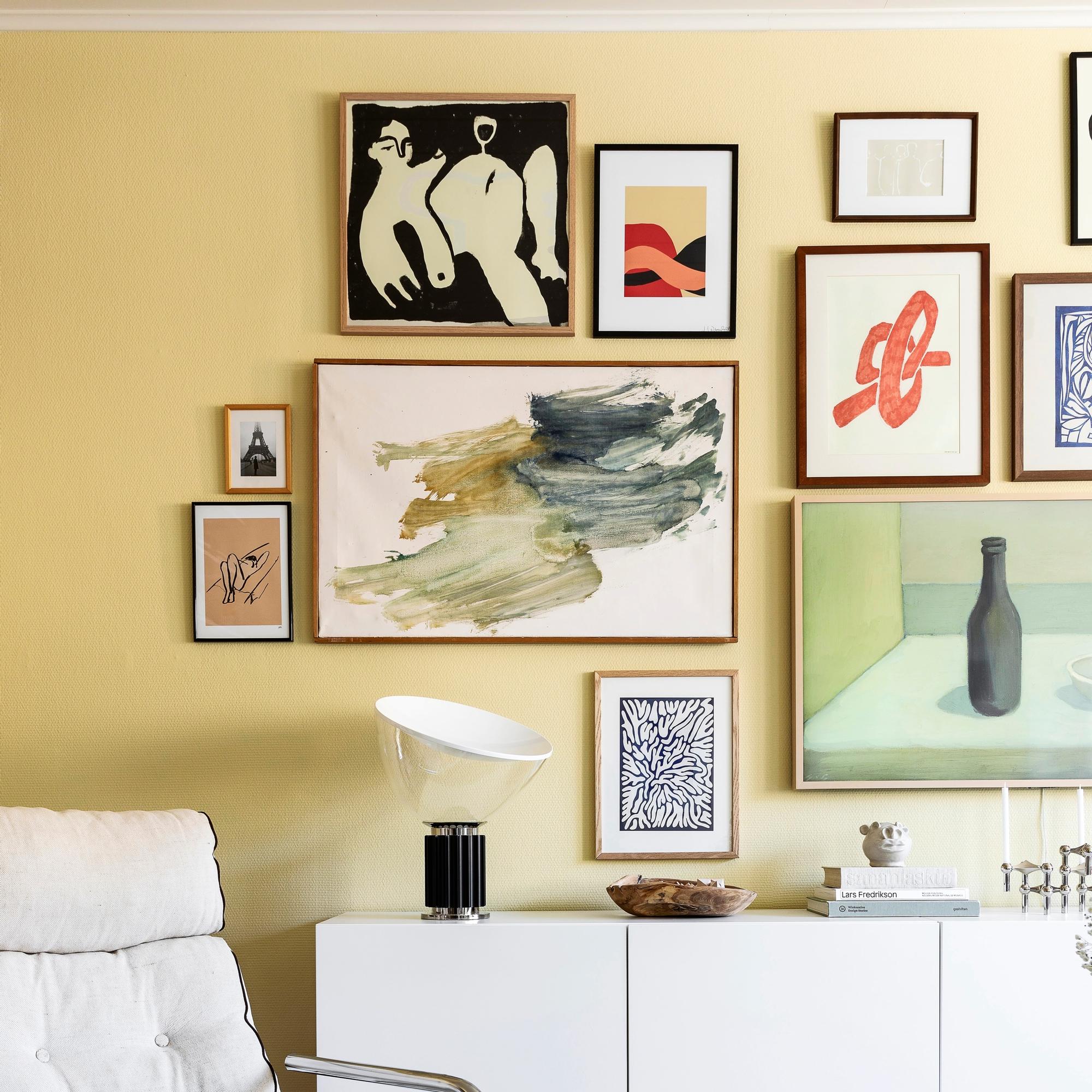 What on earth is “gallery height”? An interior designer explains how high to hang your art—read these tips!
