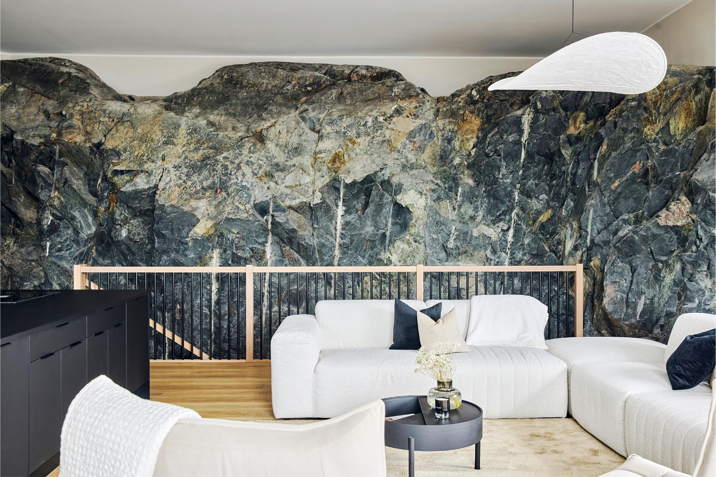 Janica and Arto built a seaside villa nestled into solid rock with no building experience