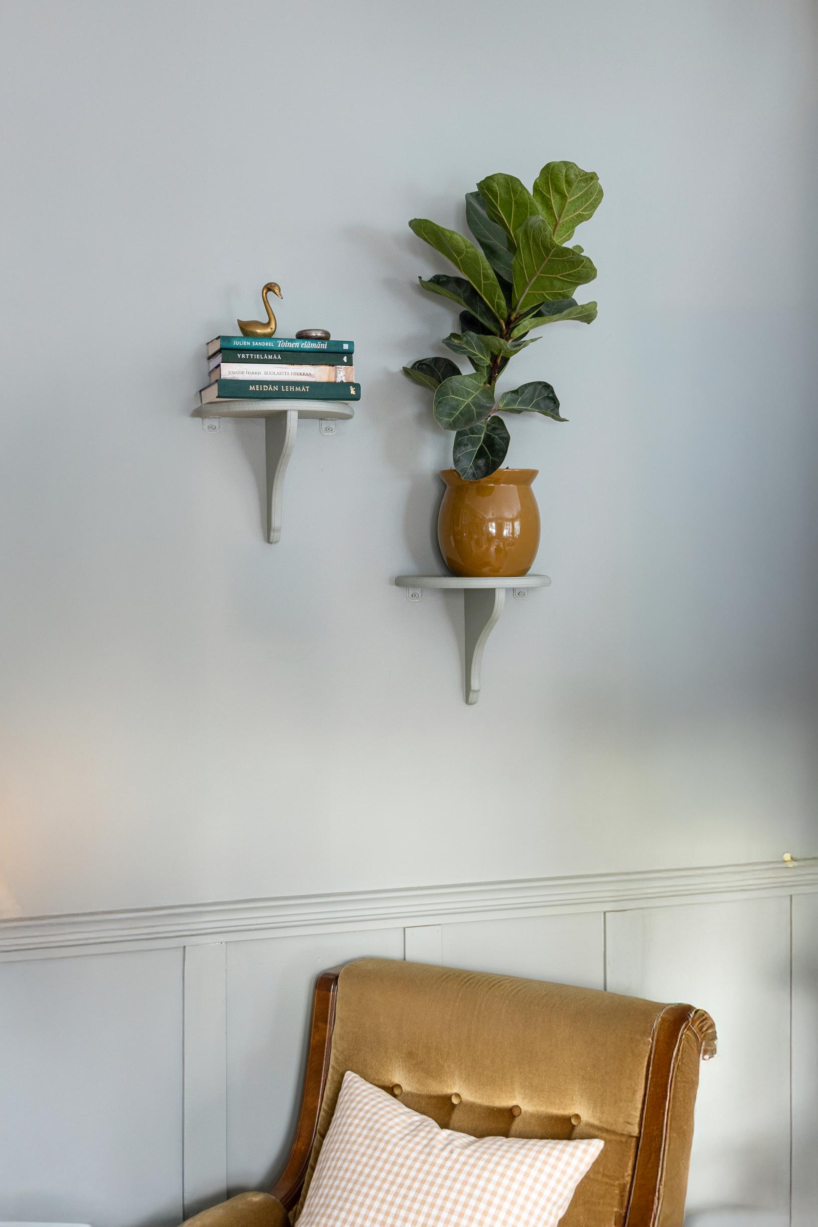 A photo of DIY wall shelves on the wall.
