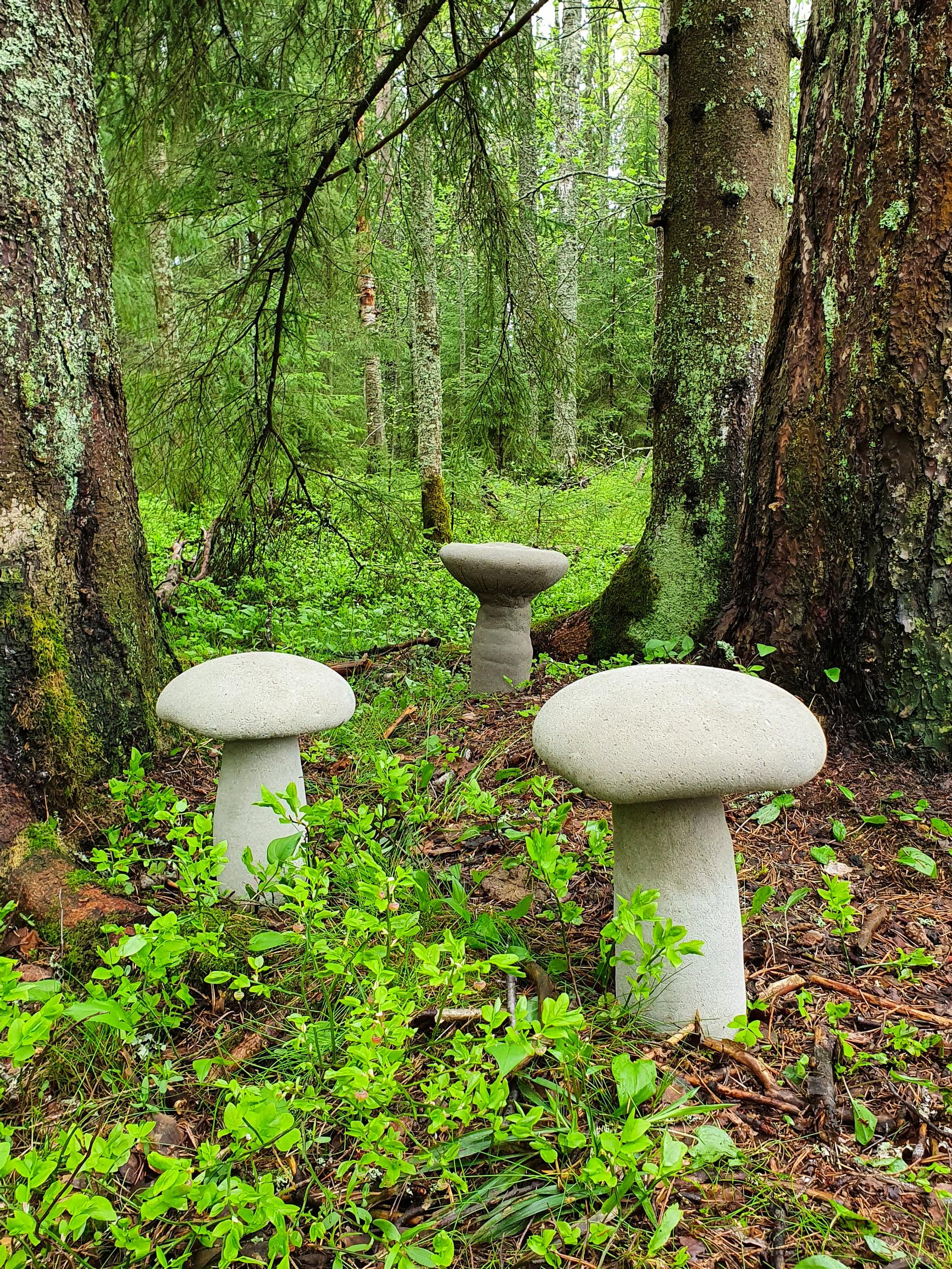 Add a fairy-tale forest vibe to your yard with frost-proof concrete mushrooms
