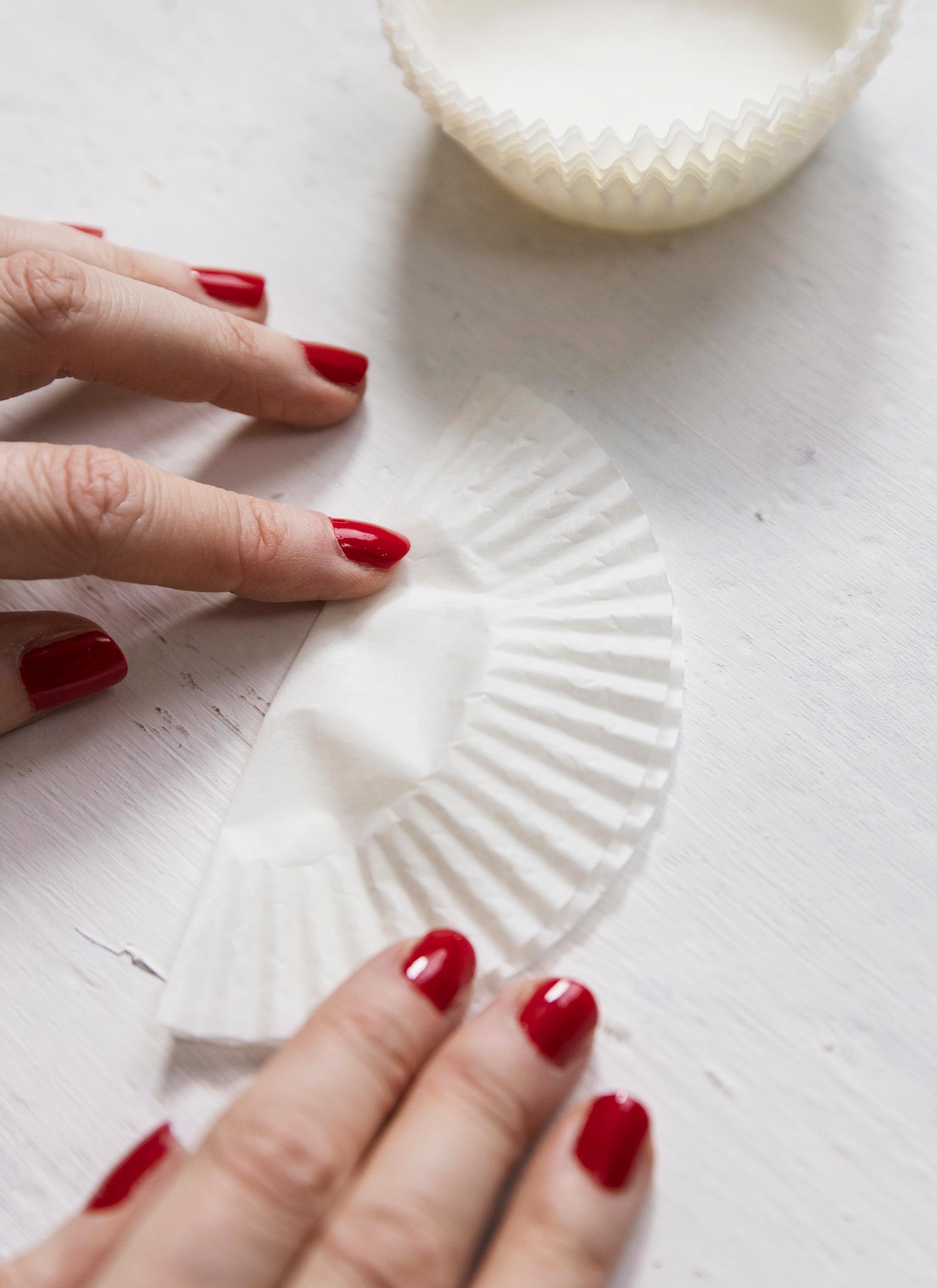 Folding a cupcake liner in half