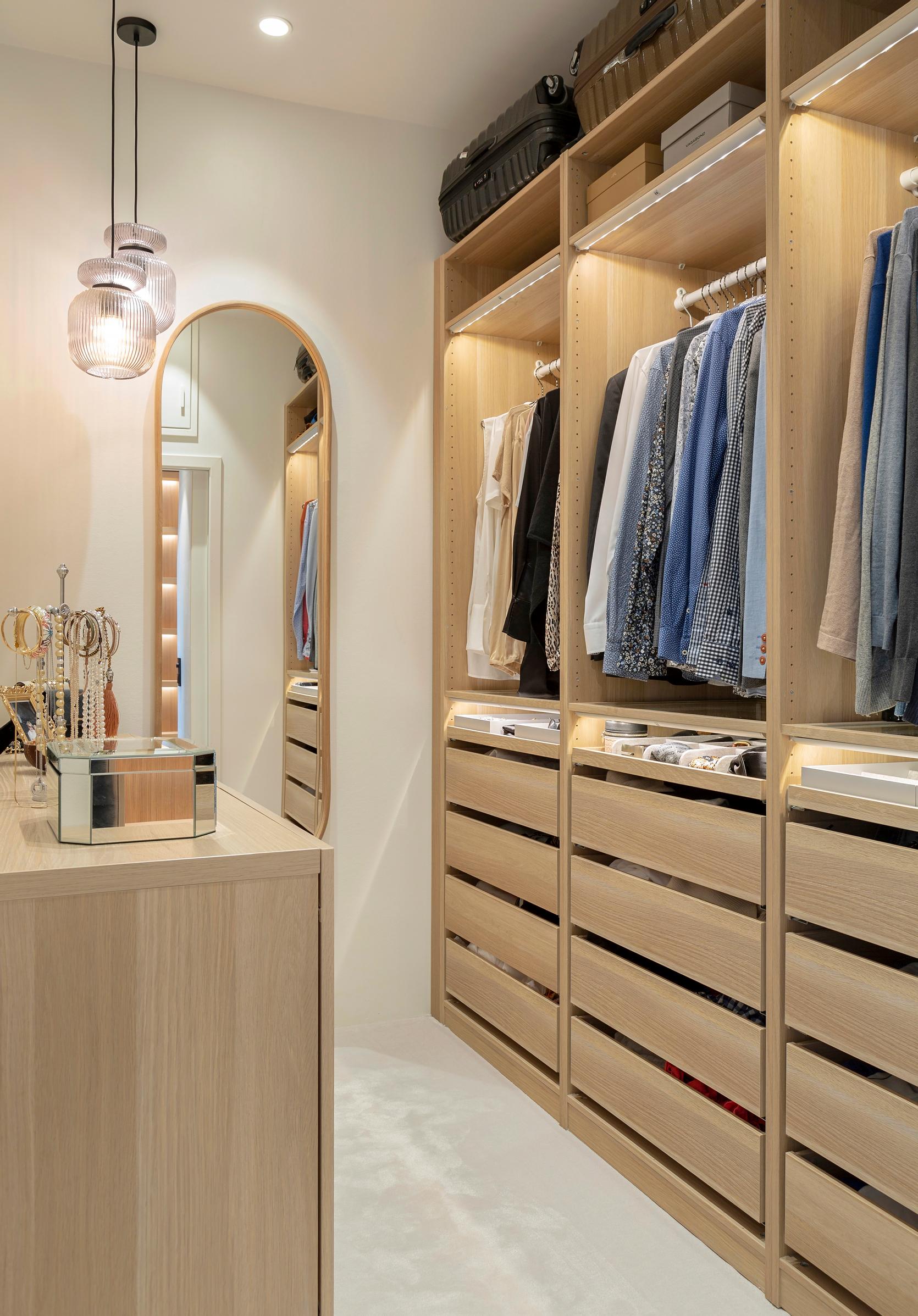 A well-lit walk-in closet