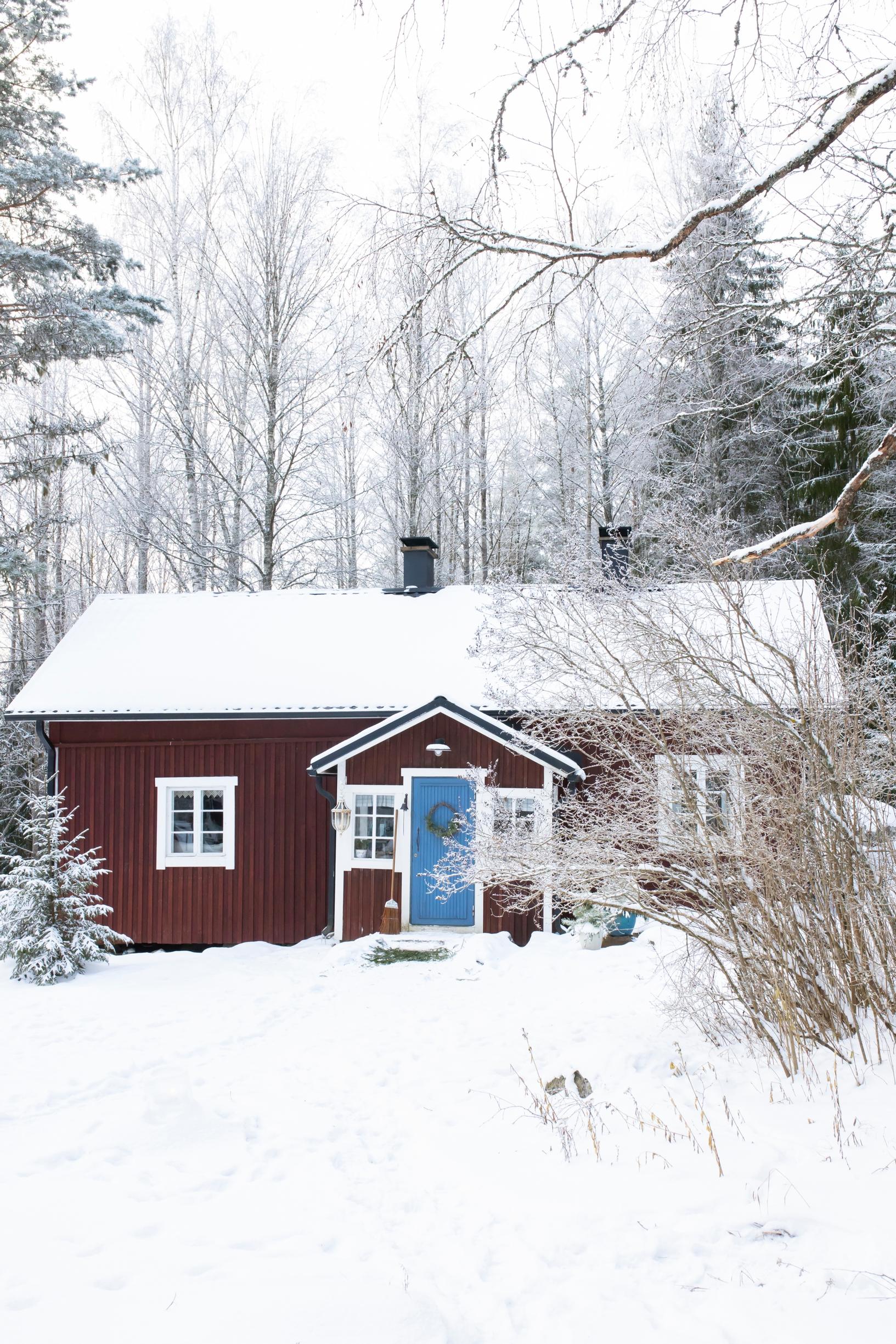 Red cottage painted with red ochre paint