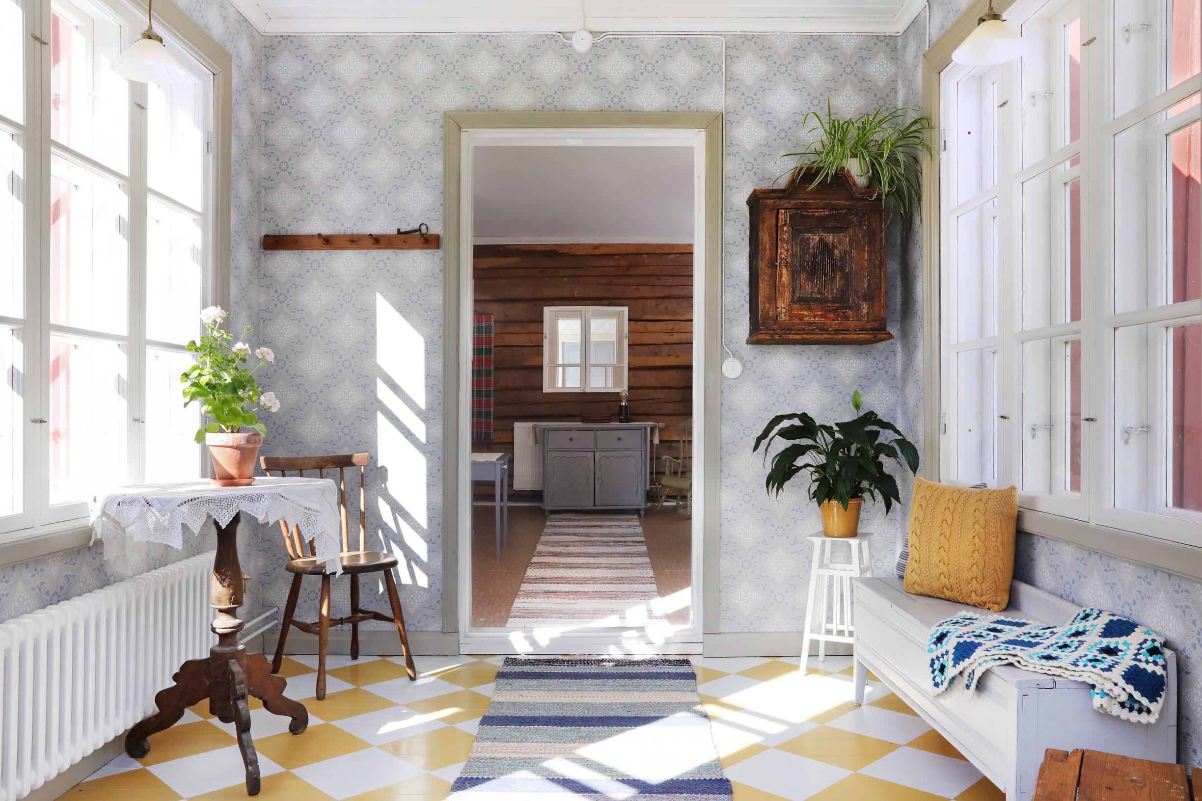 Checkered floor on the porch of the old house