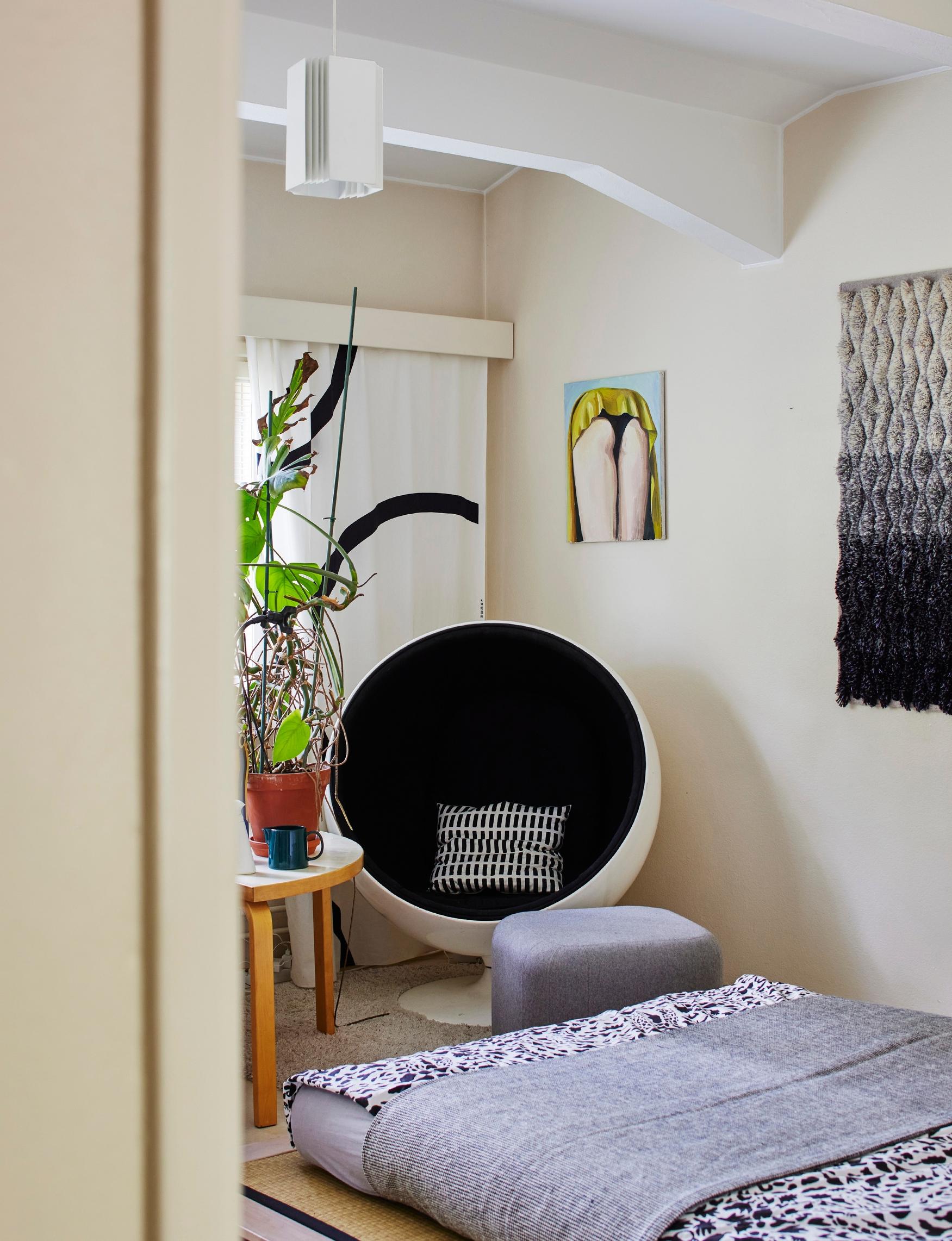 Ball chair and tatami bed in the sleeping area.