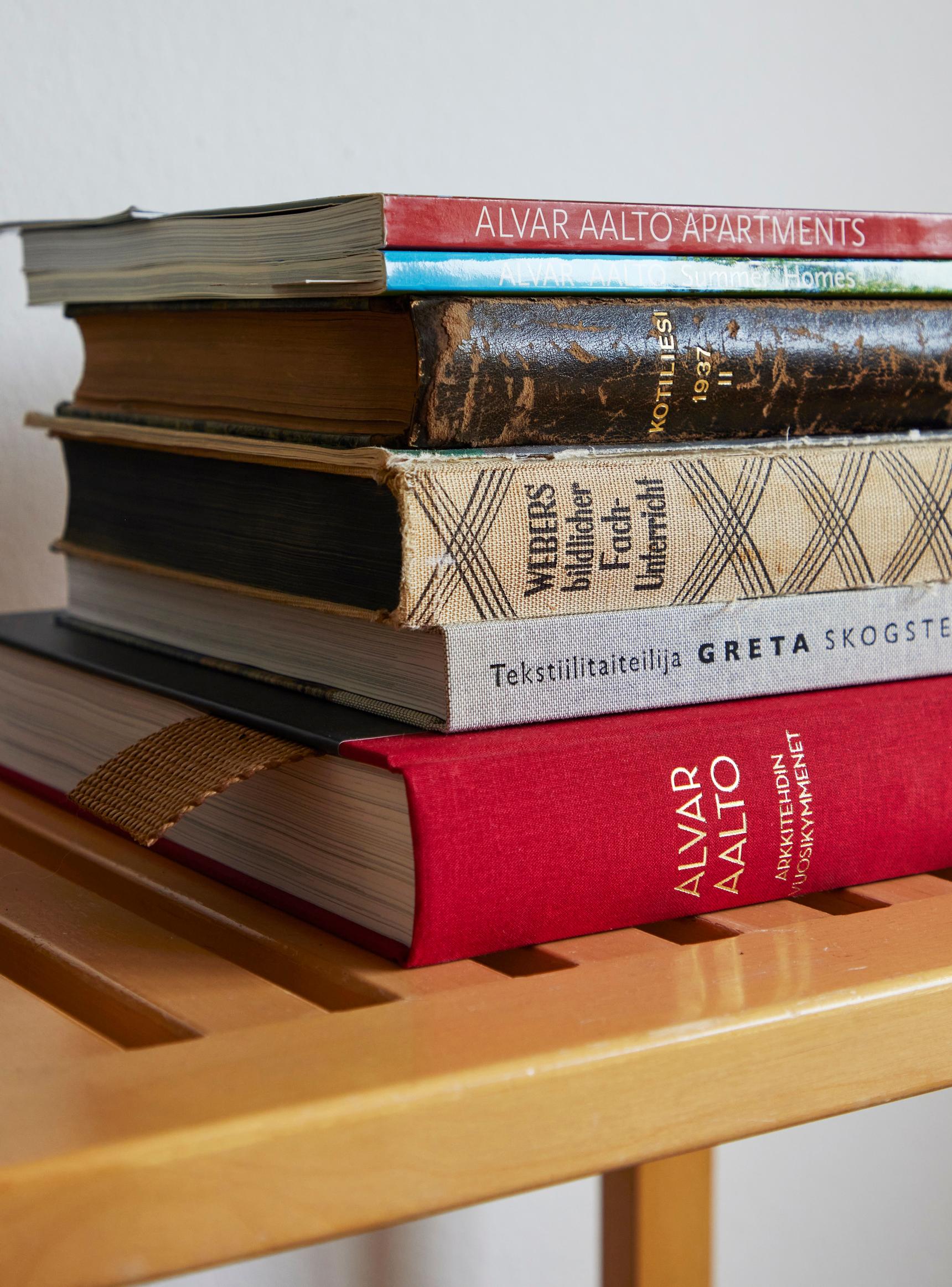 Old magazines and reference books on top of a bench