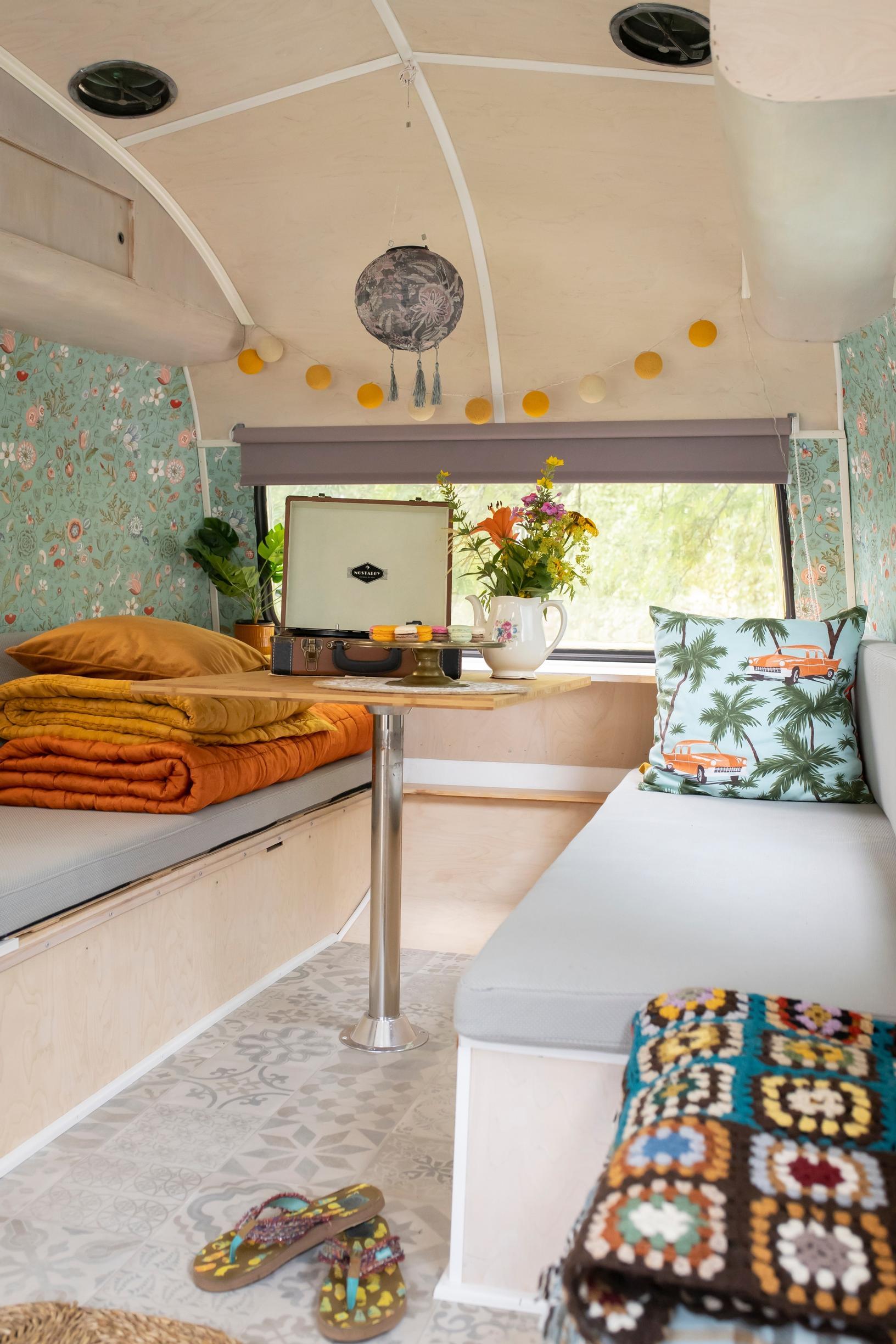 Sleeping areas and a record player in the caravan