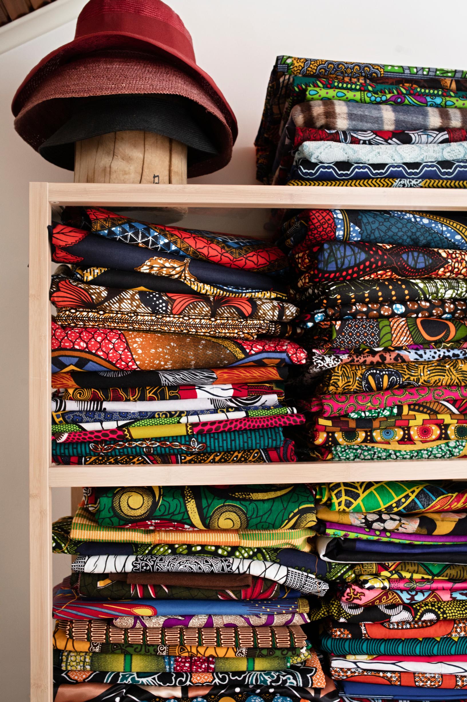 Colorful fabrics on the shelf