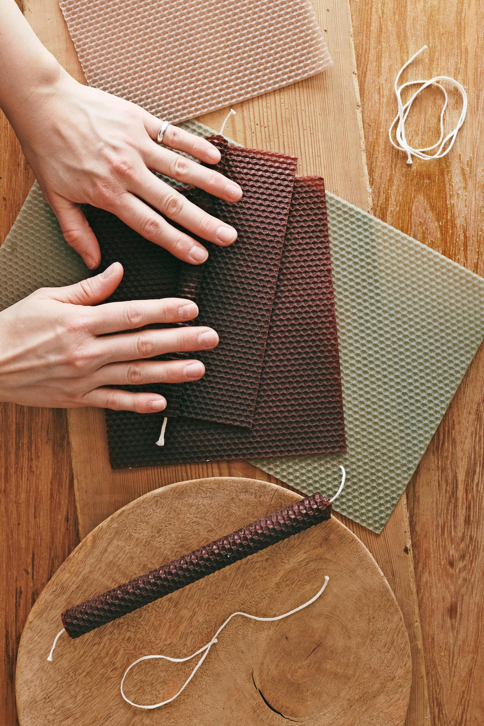 A photo of making beeswax candles.