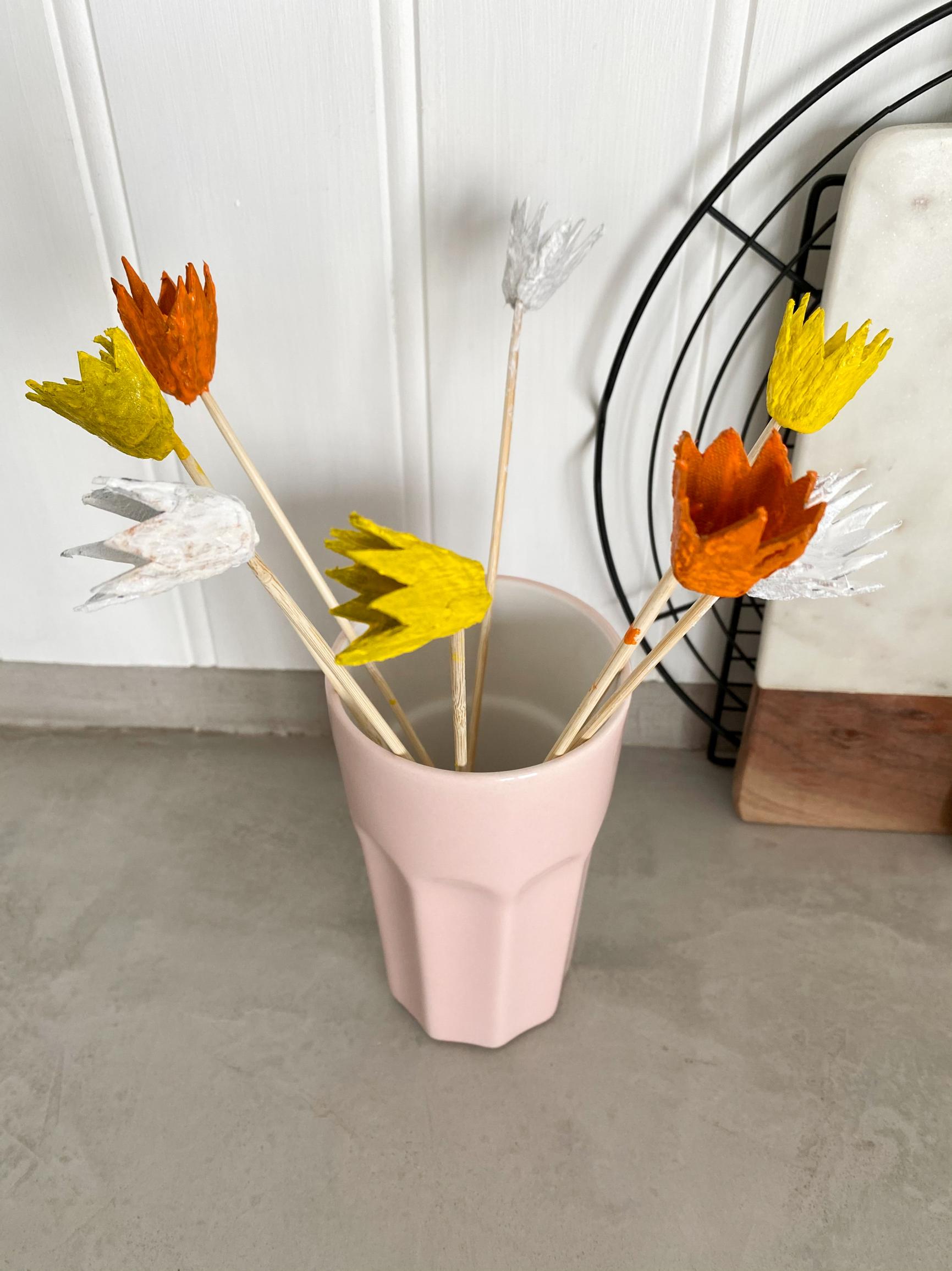 How to make paper daffodils: Painted egg carton sections drying