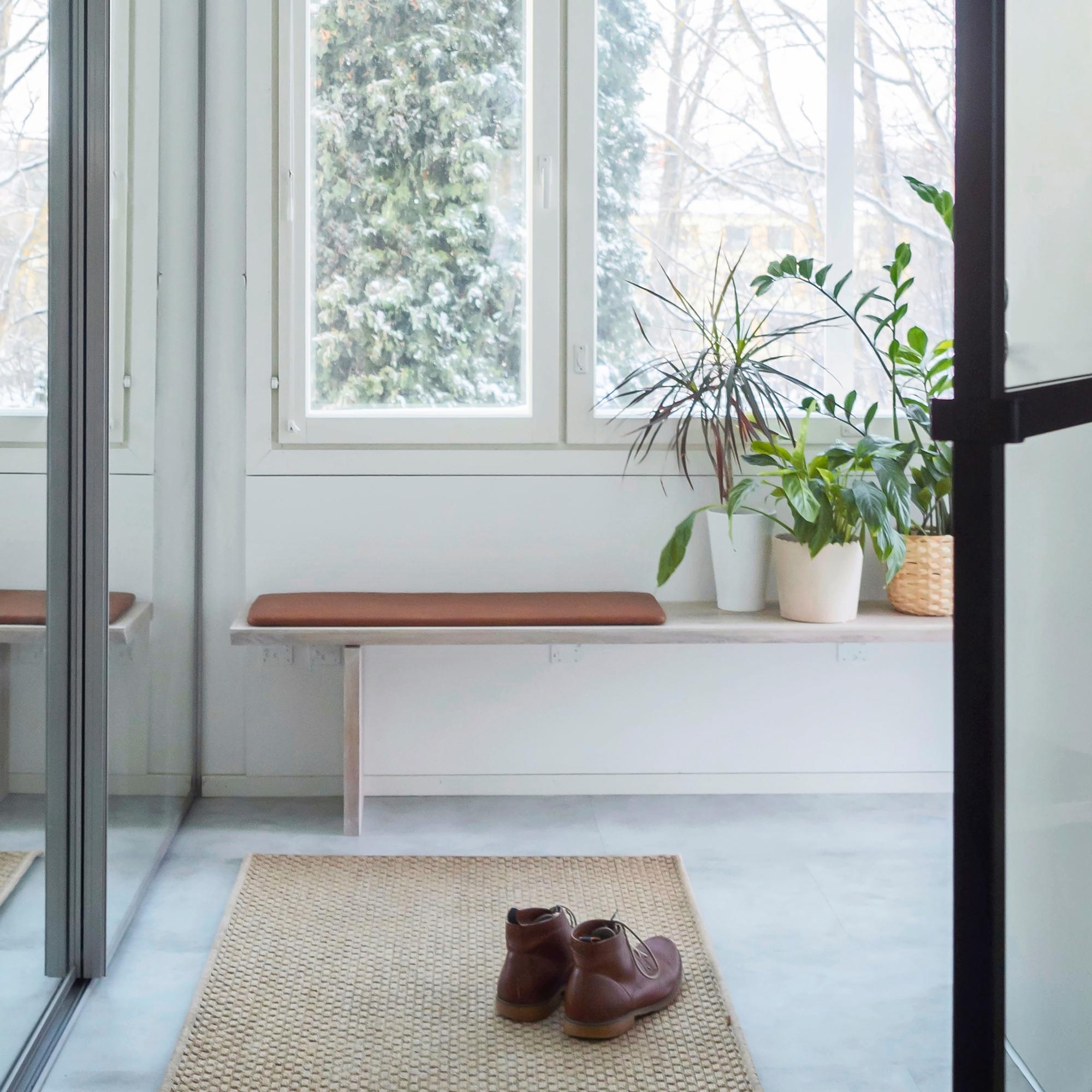 More surface space and seating for your entryway—build a wall-mounted bench with our step-by-step guide