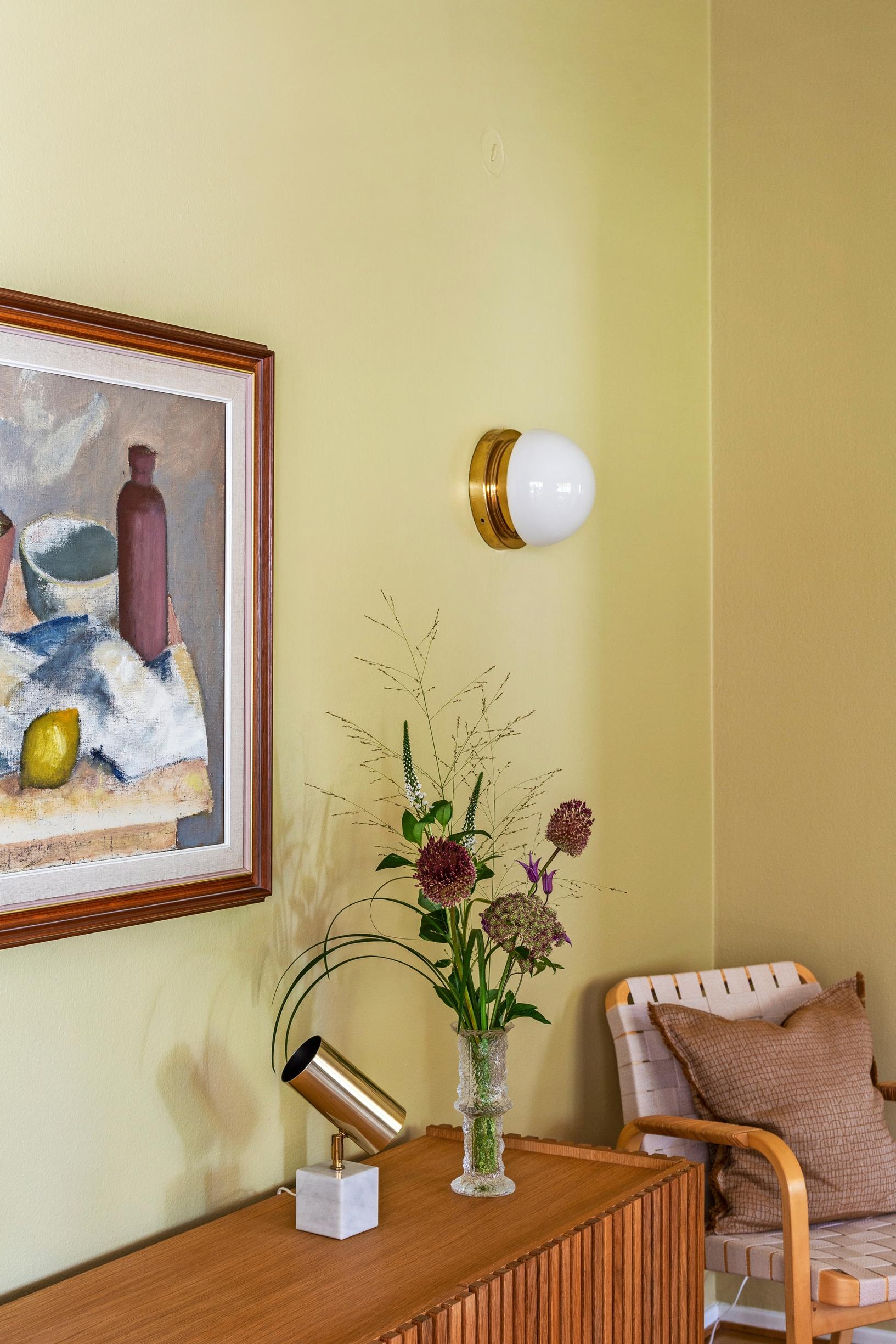 A painting above the sideboard