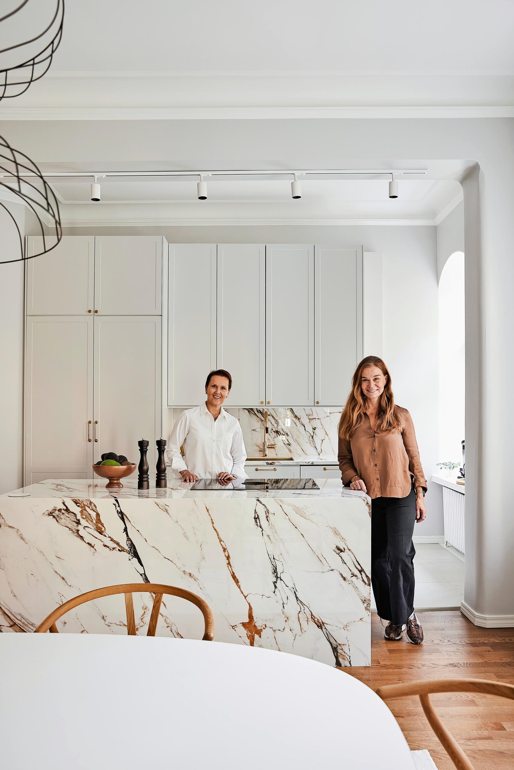 Saija Silvola and interior designer Johanna Lehmuskallio in the kitchen