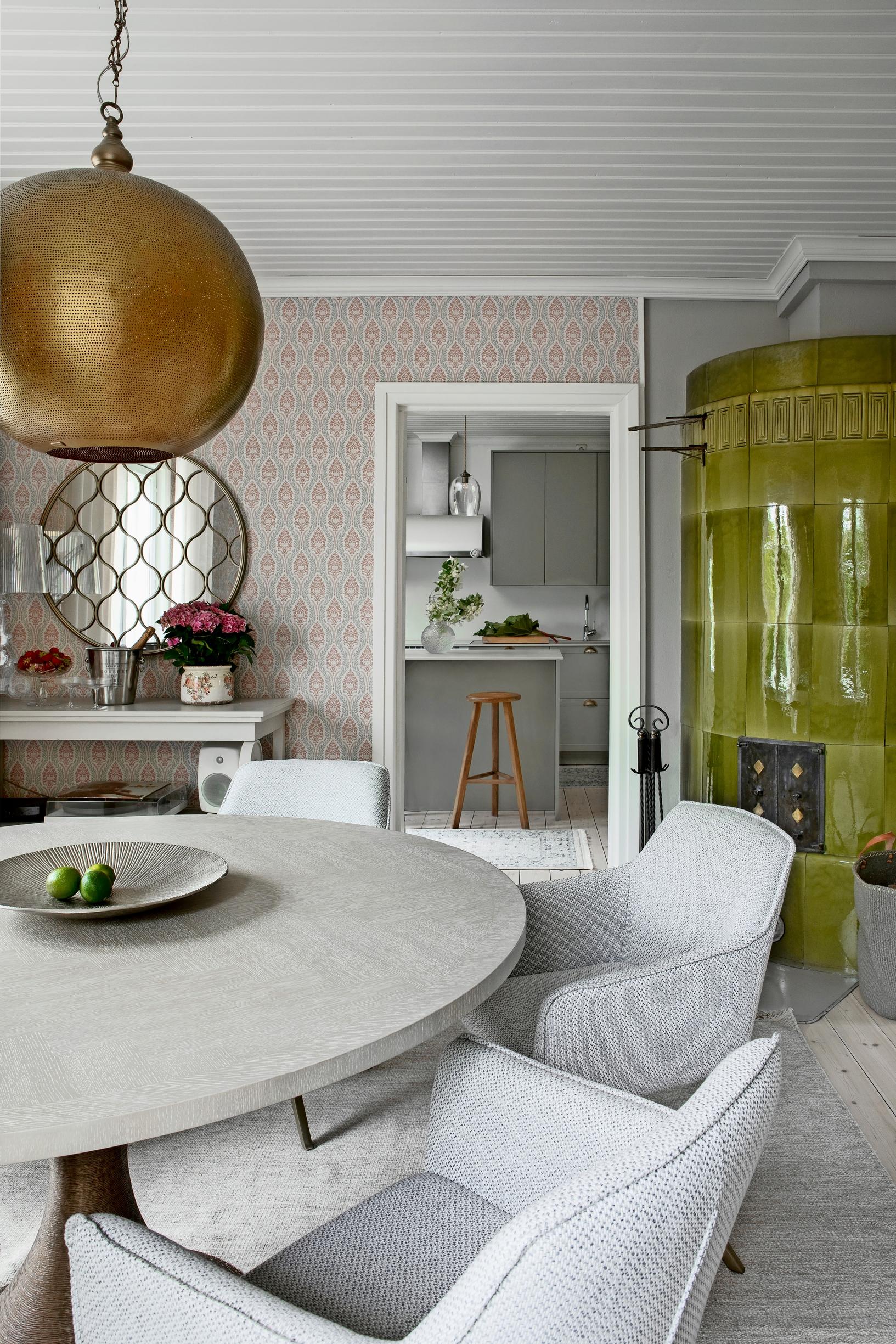 tiled stove and round dining table
