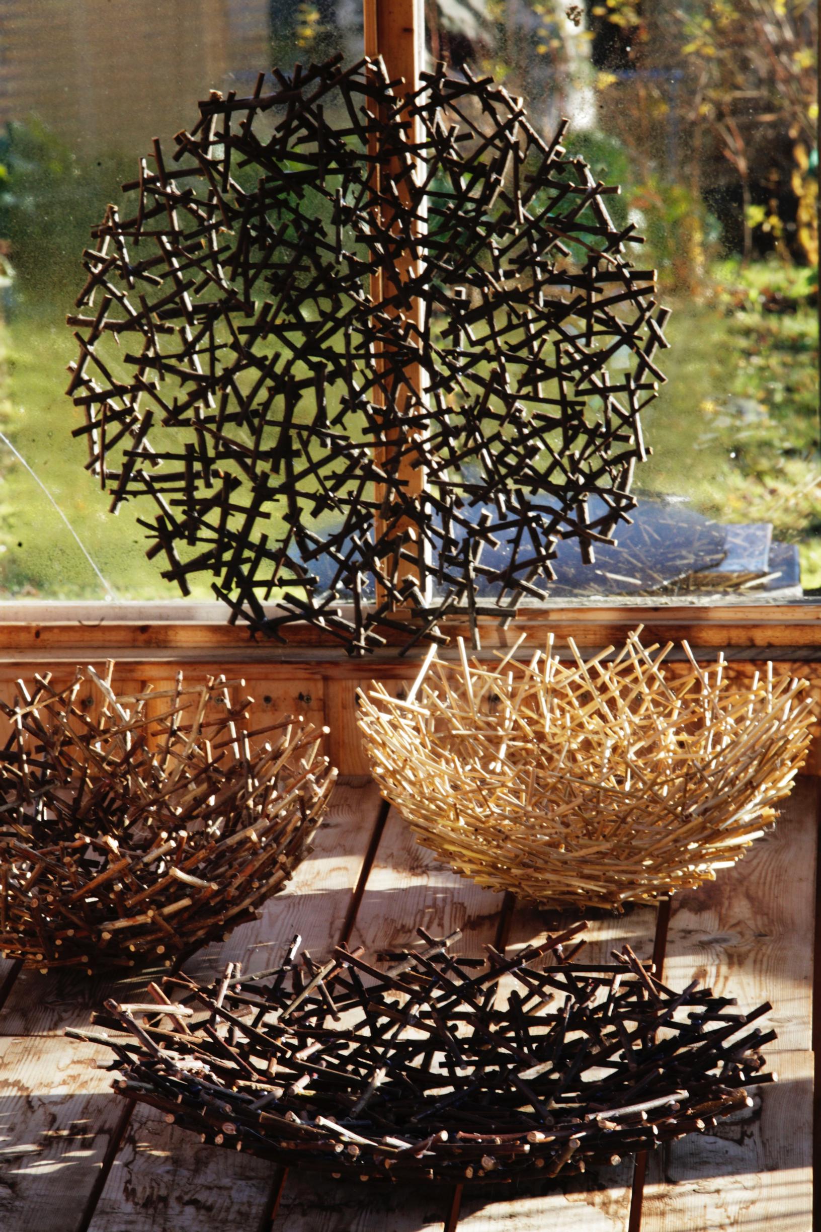 A bowl made from branches.