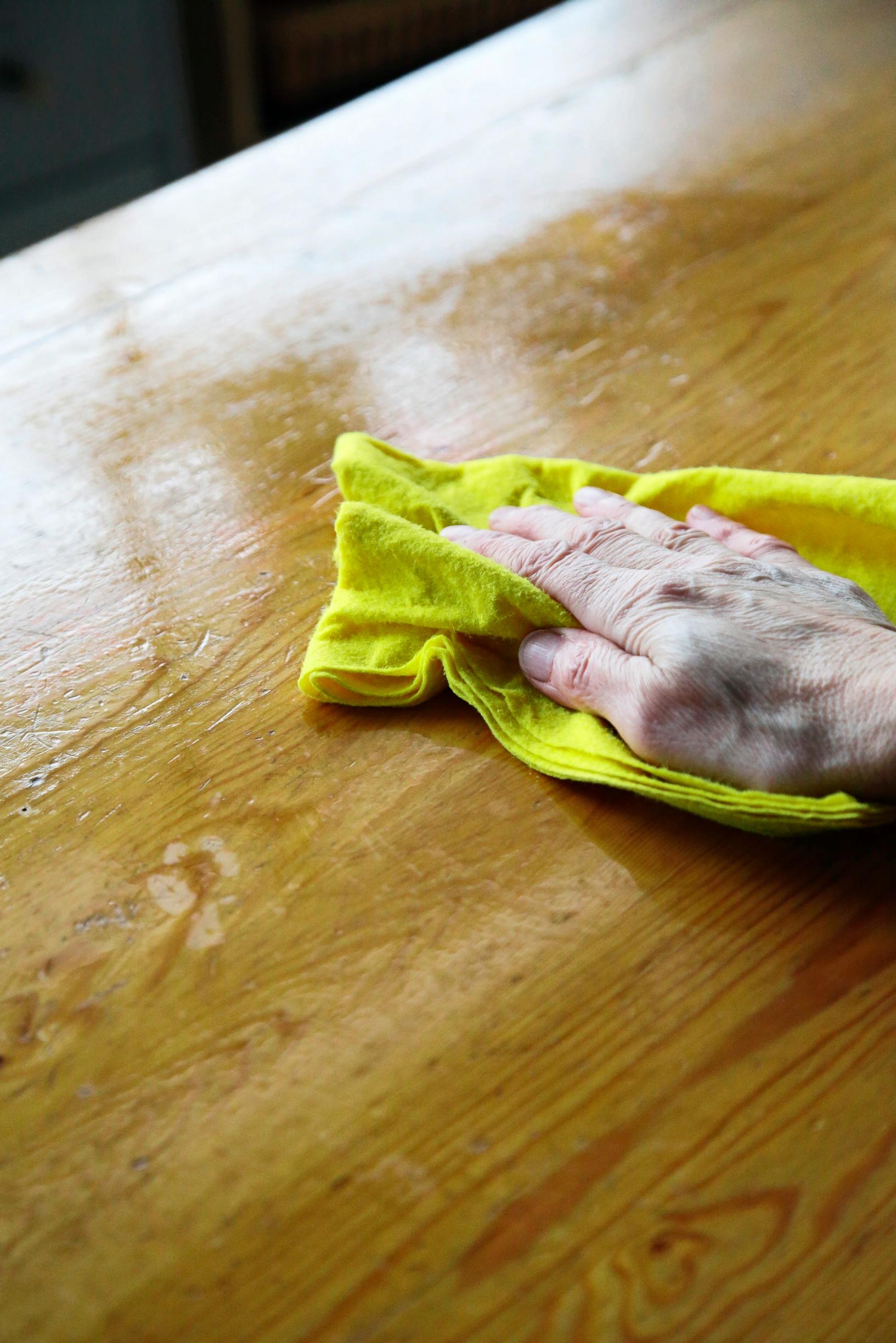 Washing a yellowed pine table before sanding