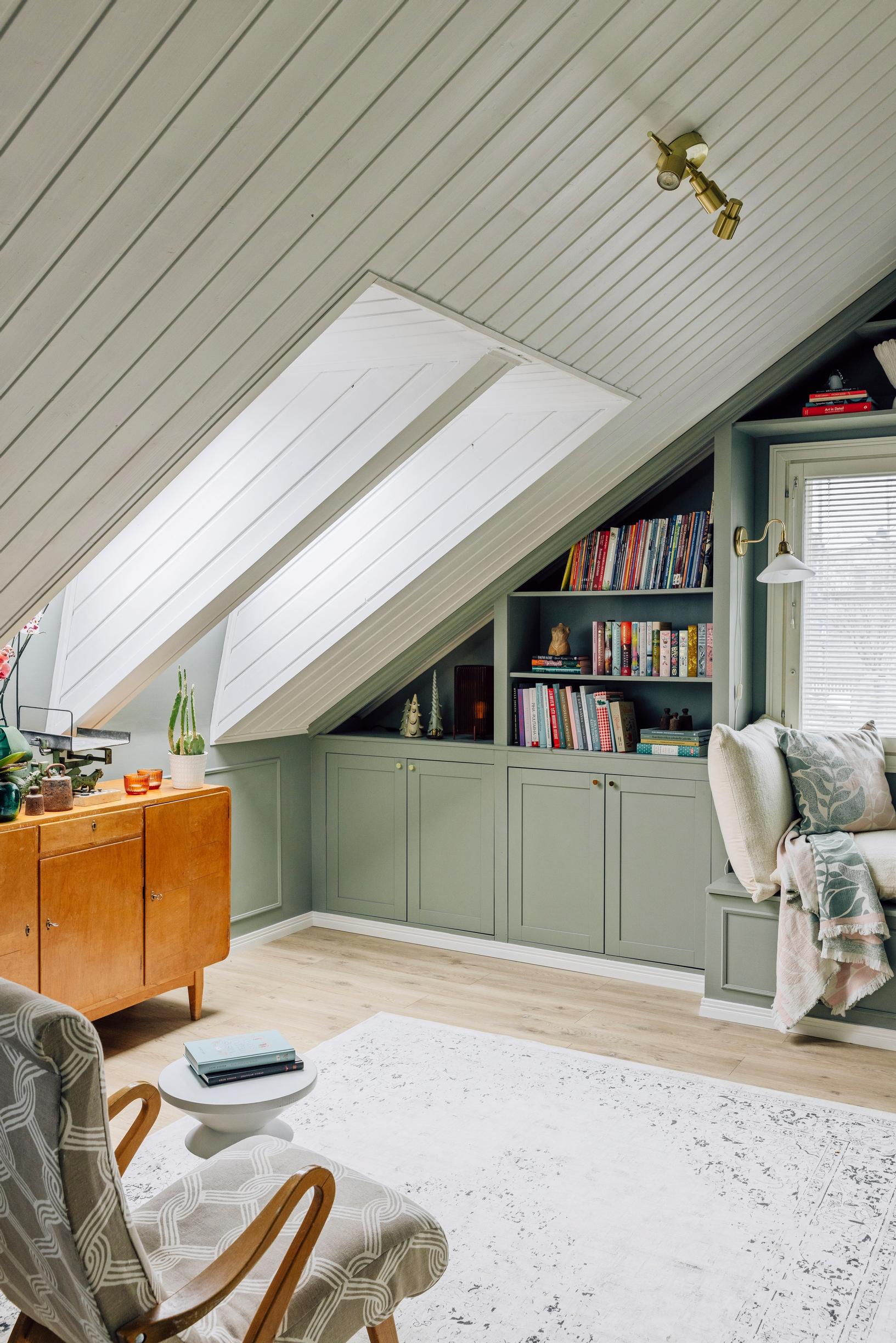 On the left, in the slanted ceiling, are two large, identical skylights side by side.