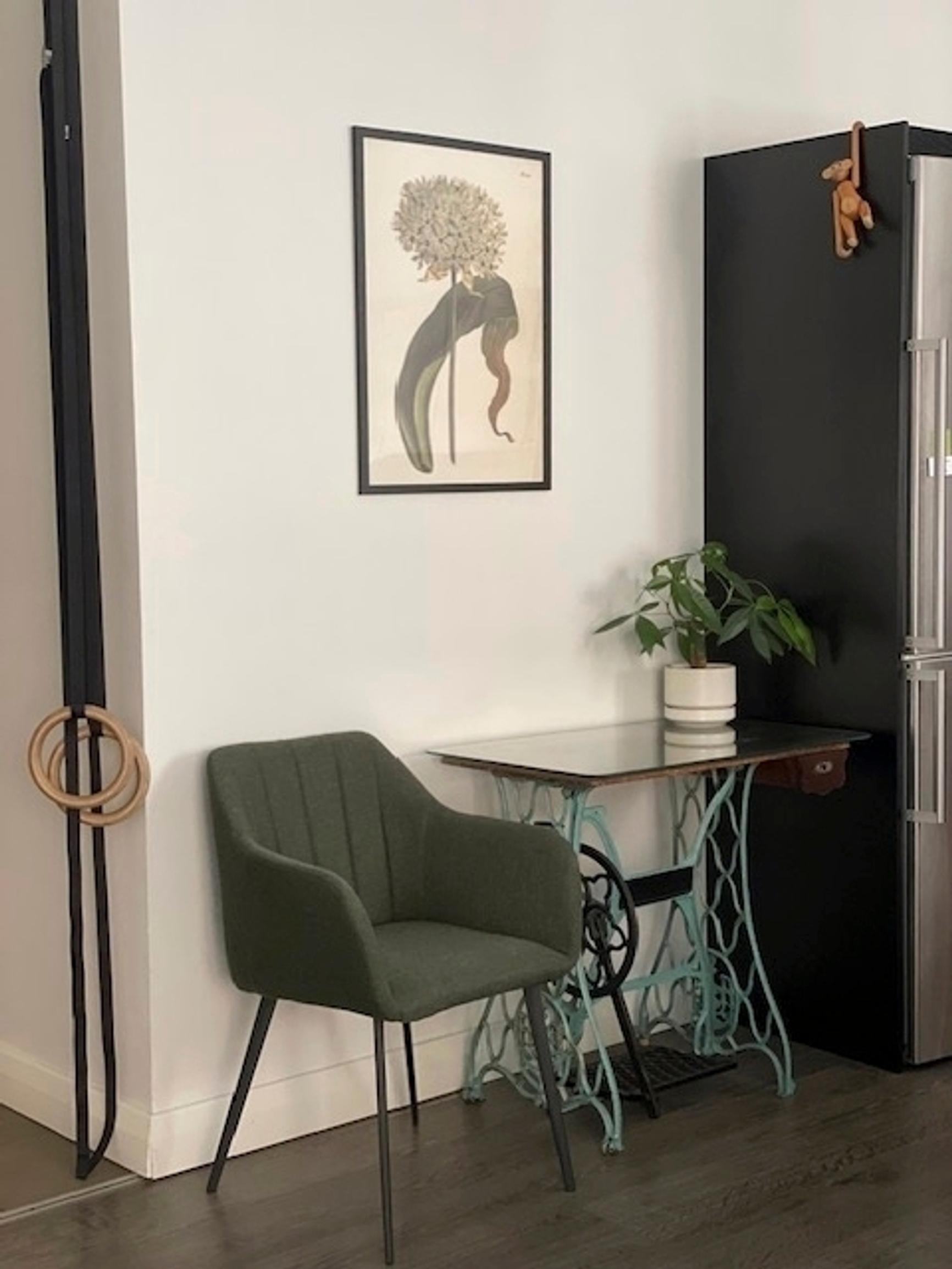 A sewing machine table and a chair