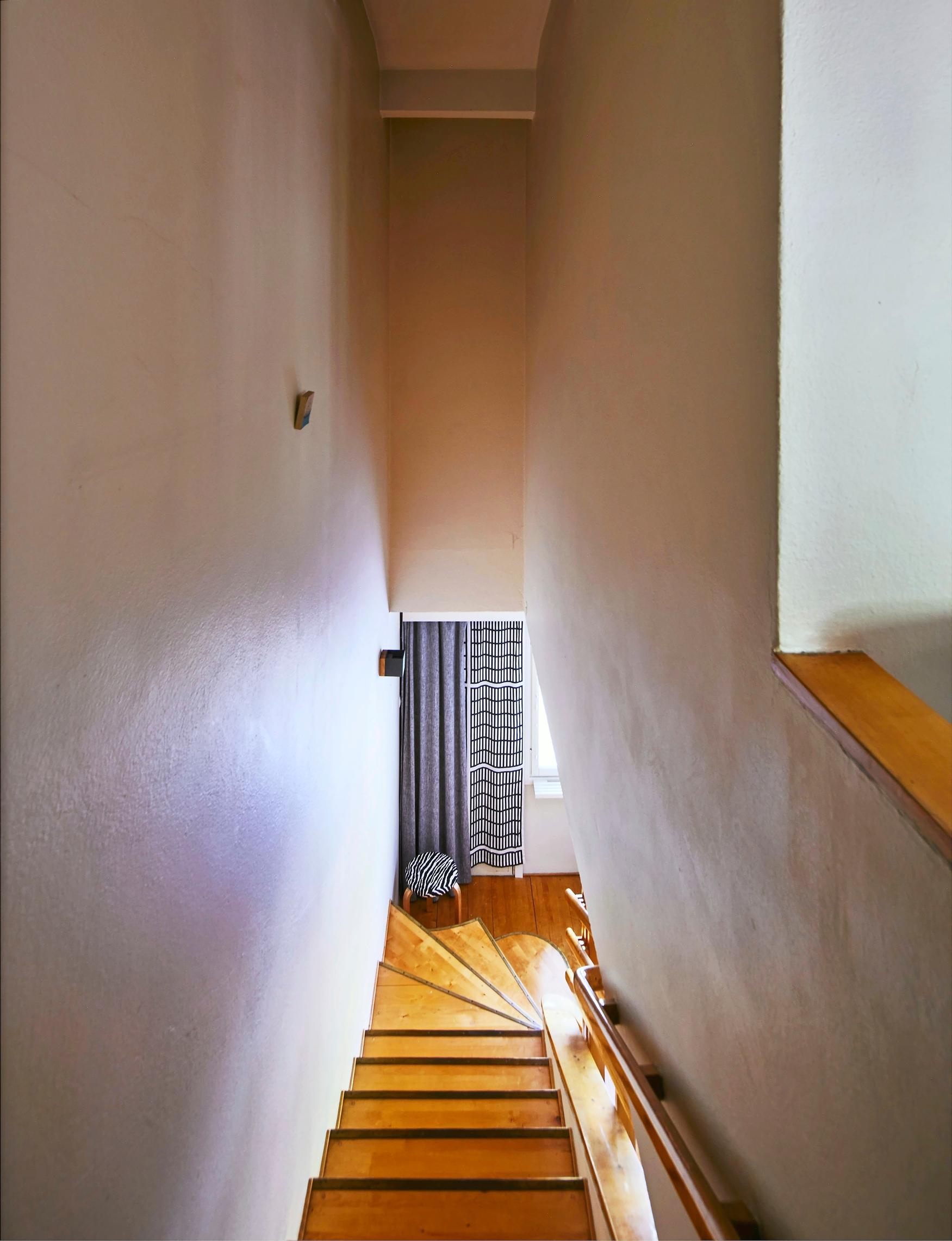 The highest space in the apartment is in the narrow staircase.