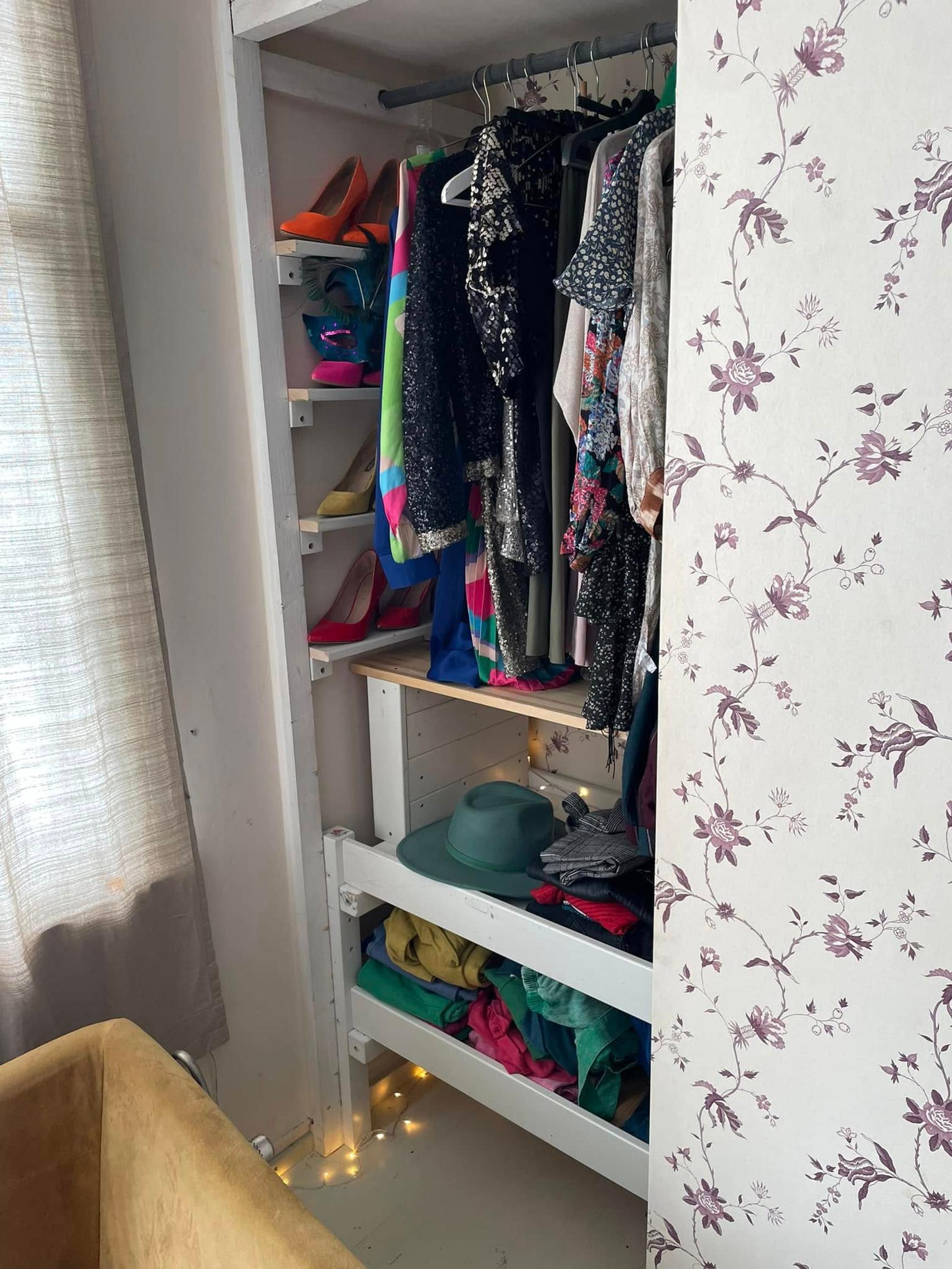 Small shelves for high heels on the inside wall of the closet.