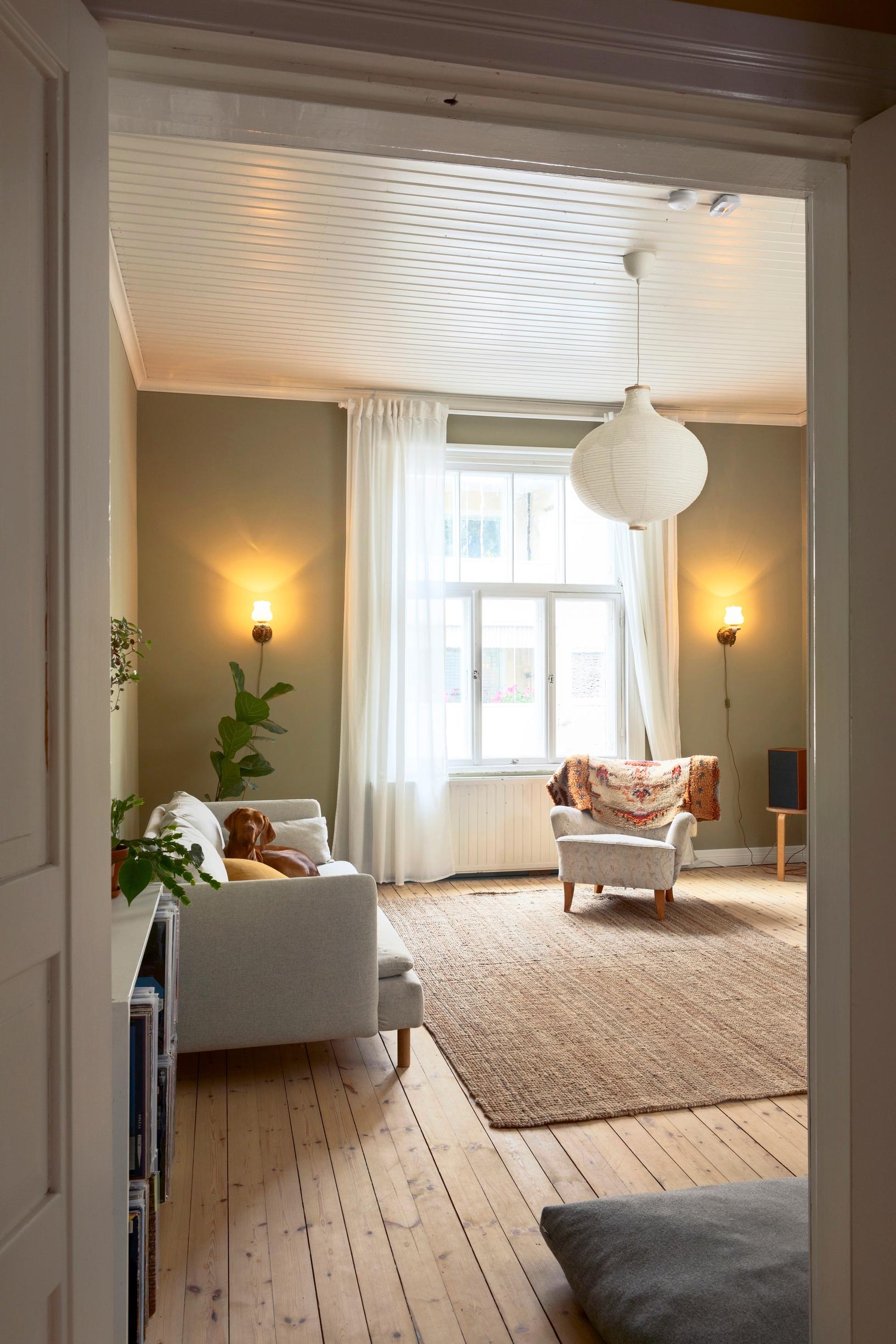 Light-toned living room walls and floors.