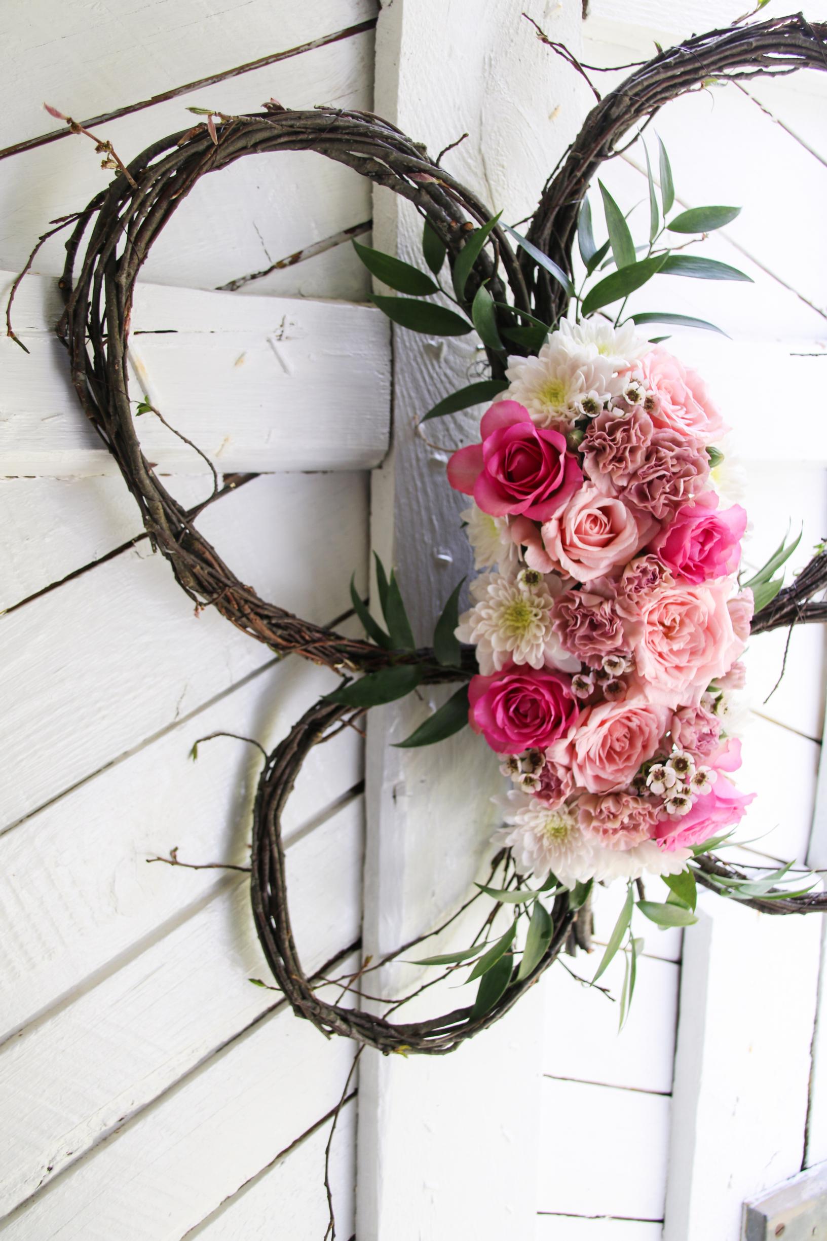 Twig butterfly as a base for floral arrangement