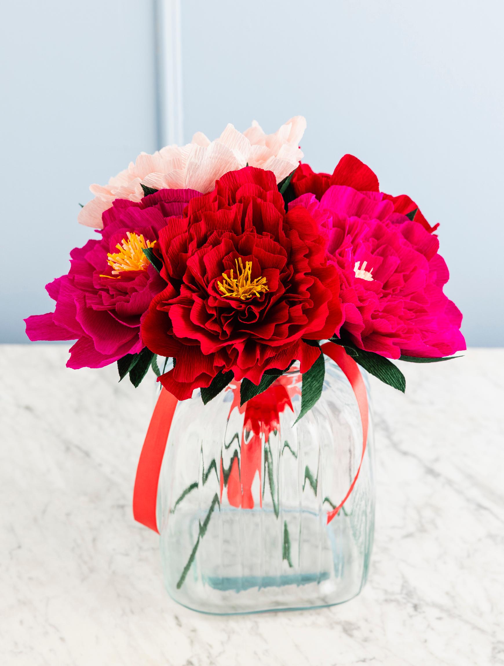 A bouquet of paper peonies in a vase
