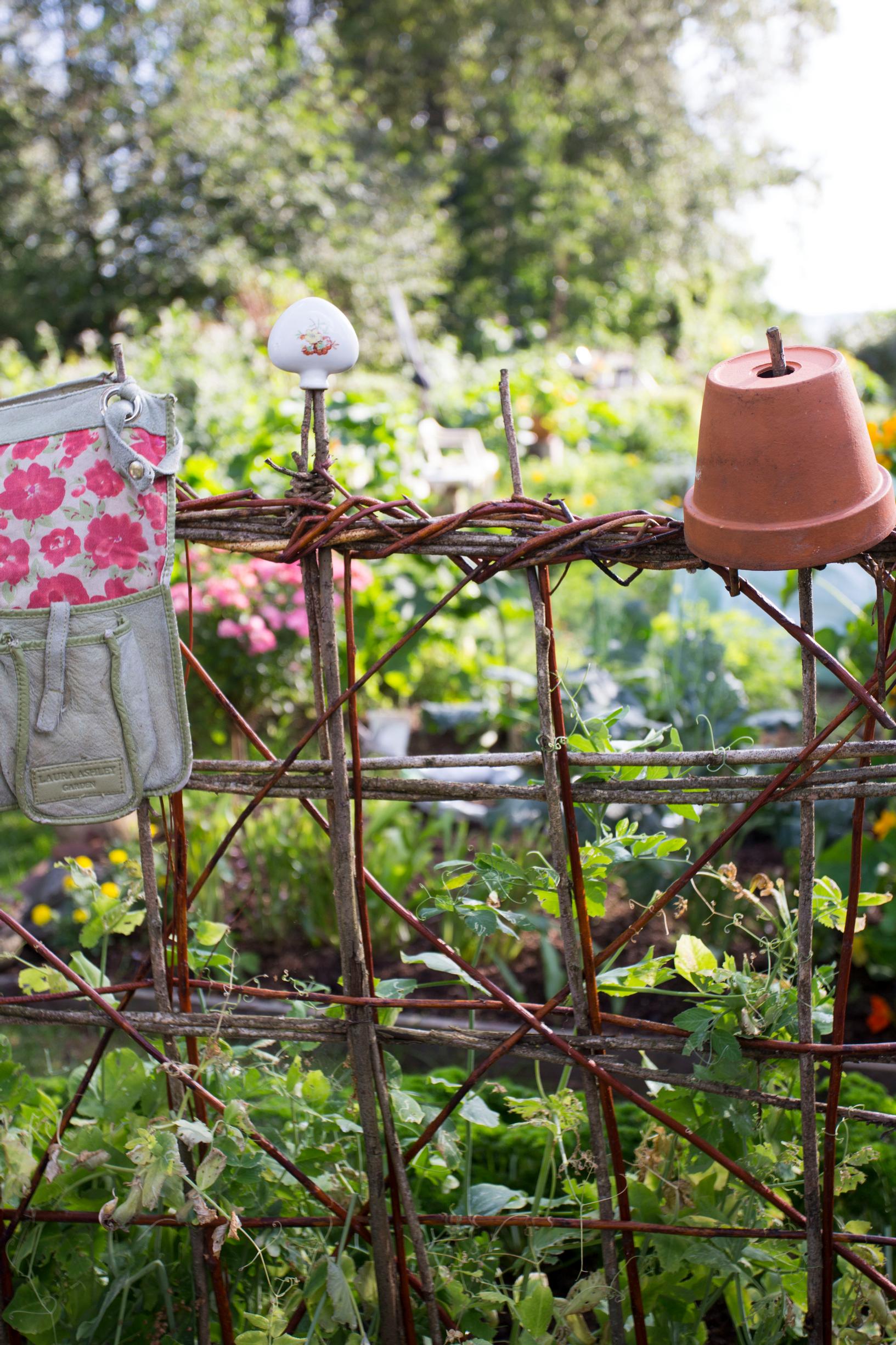 A space divider made from branches in the garden