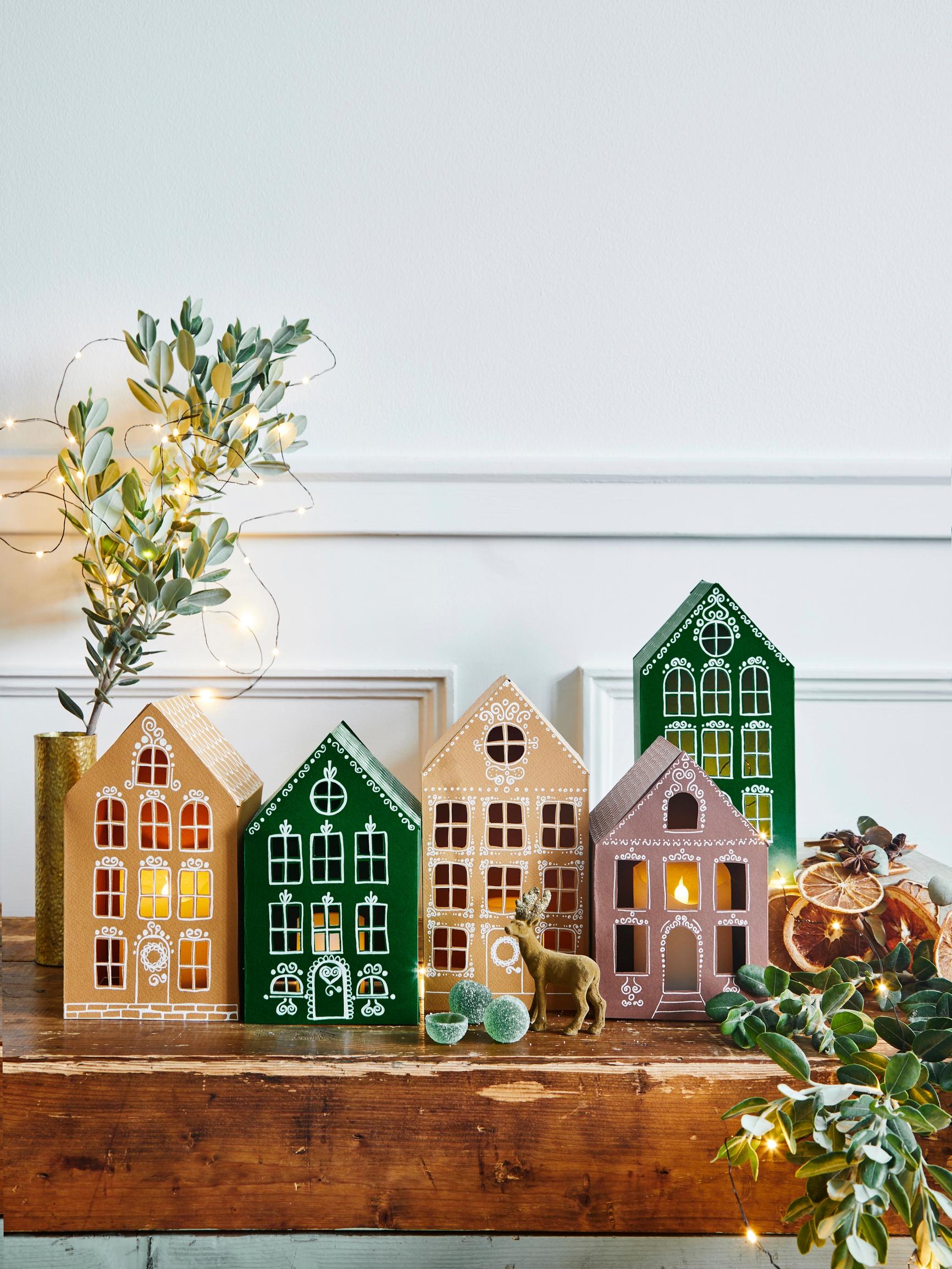Light up your windows with gingerbread-style lanterns: create an idyllic paper village