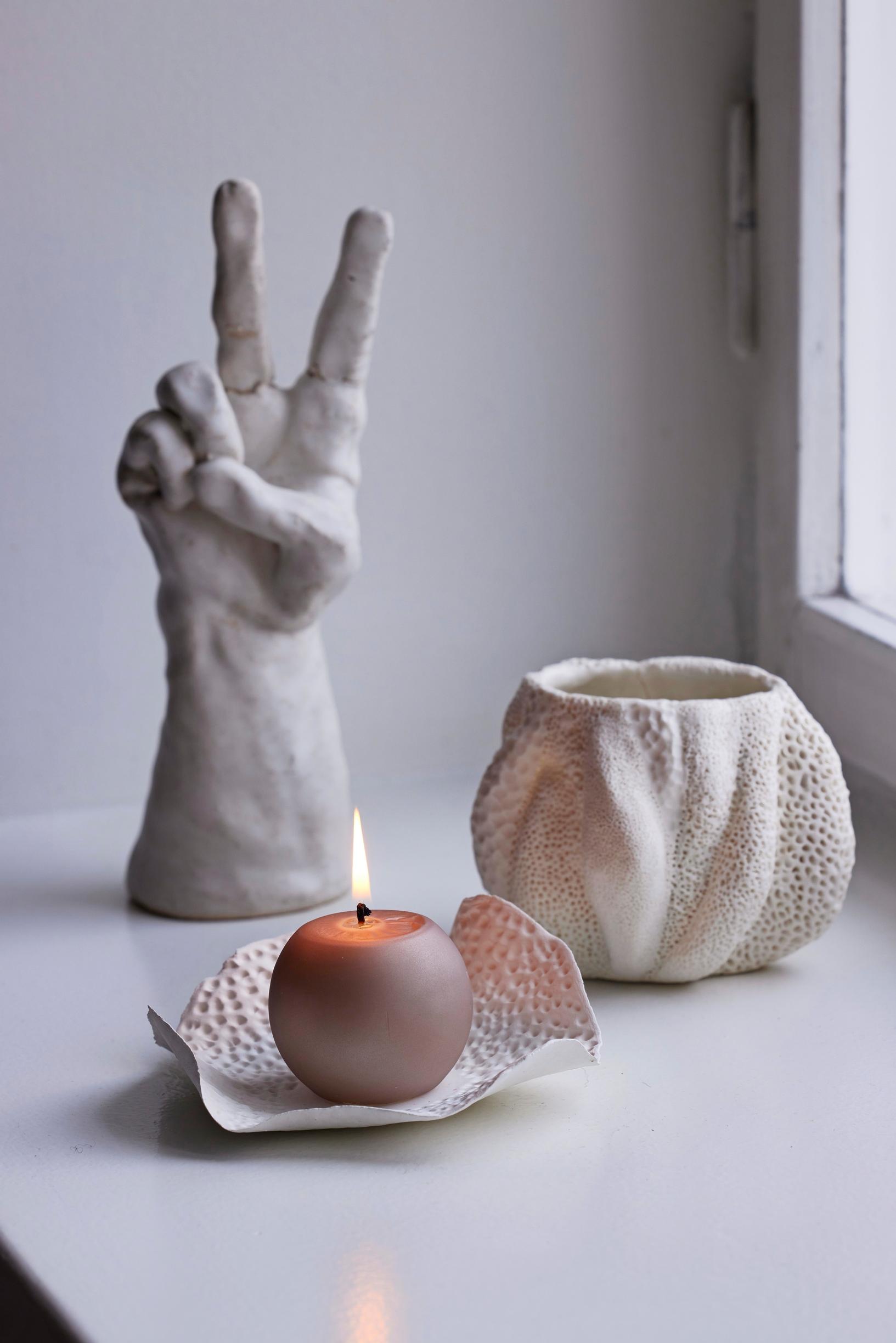 Candle holders made of air‑dry clay.