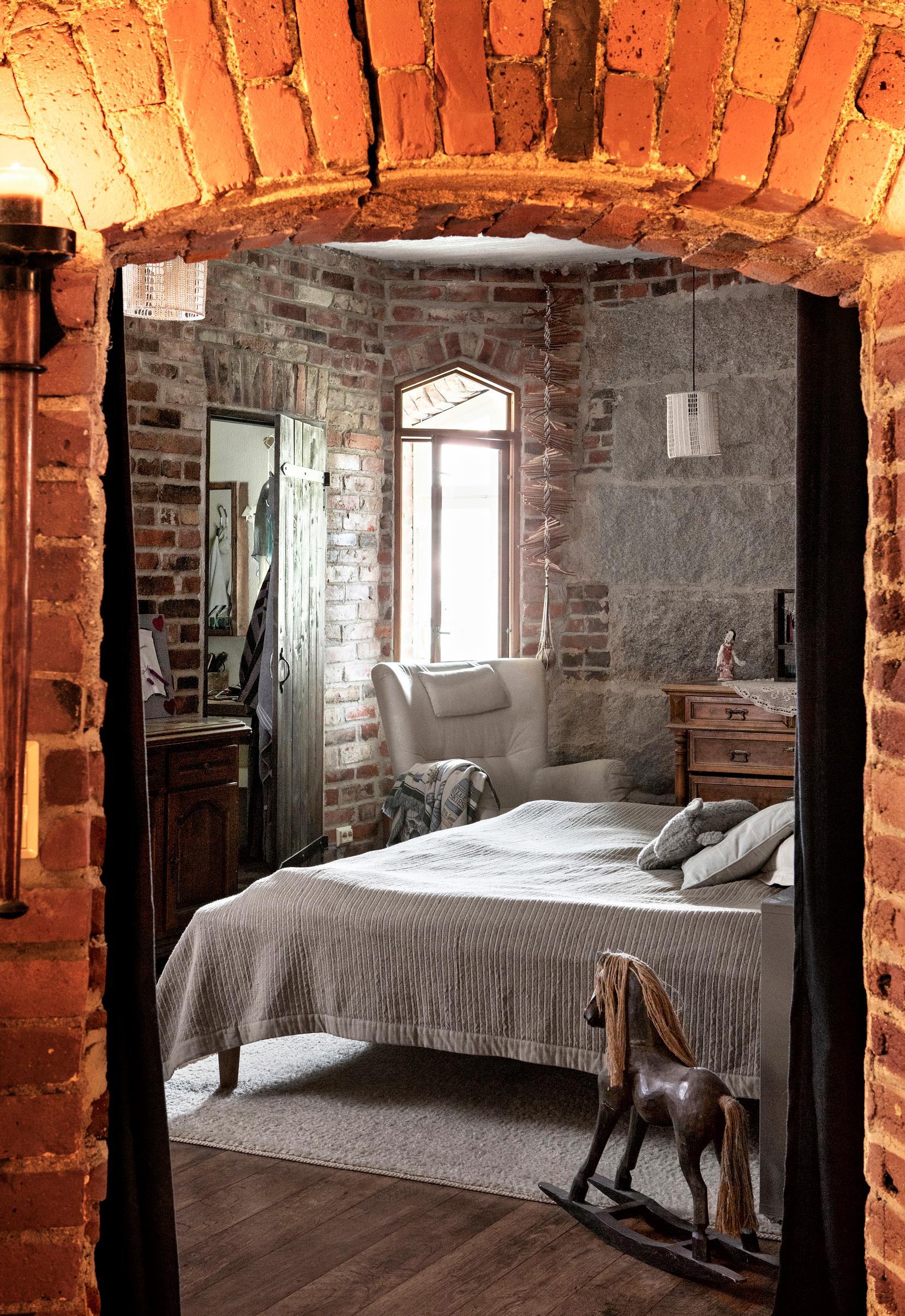 The barn home’s bedroom