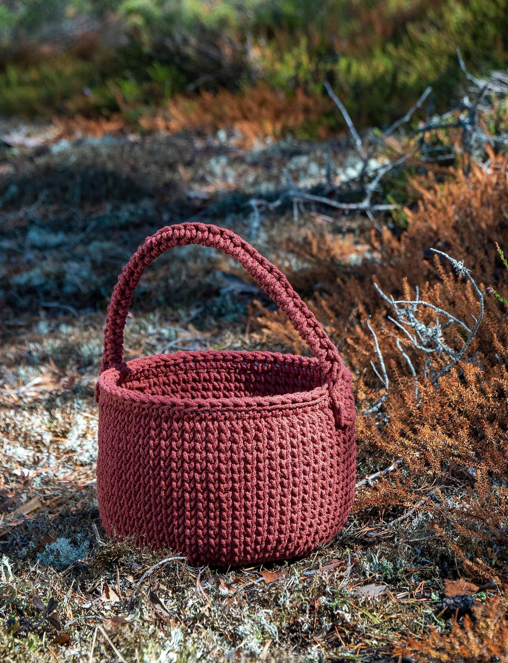 Crocheted basket with a plywood base