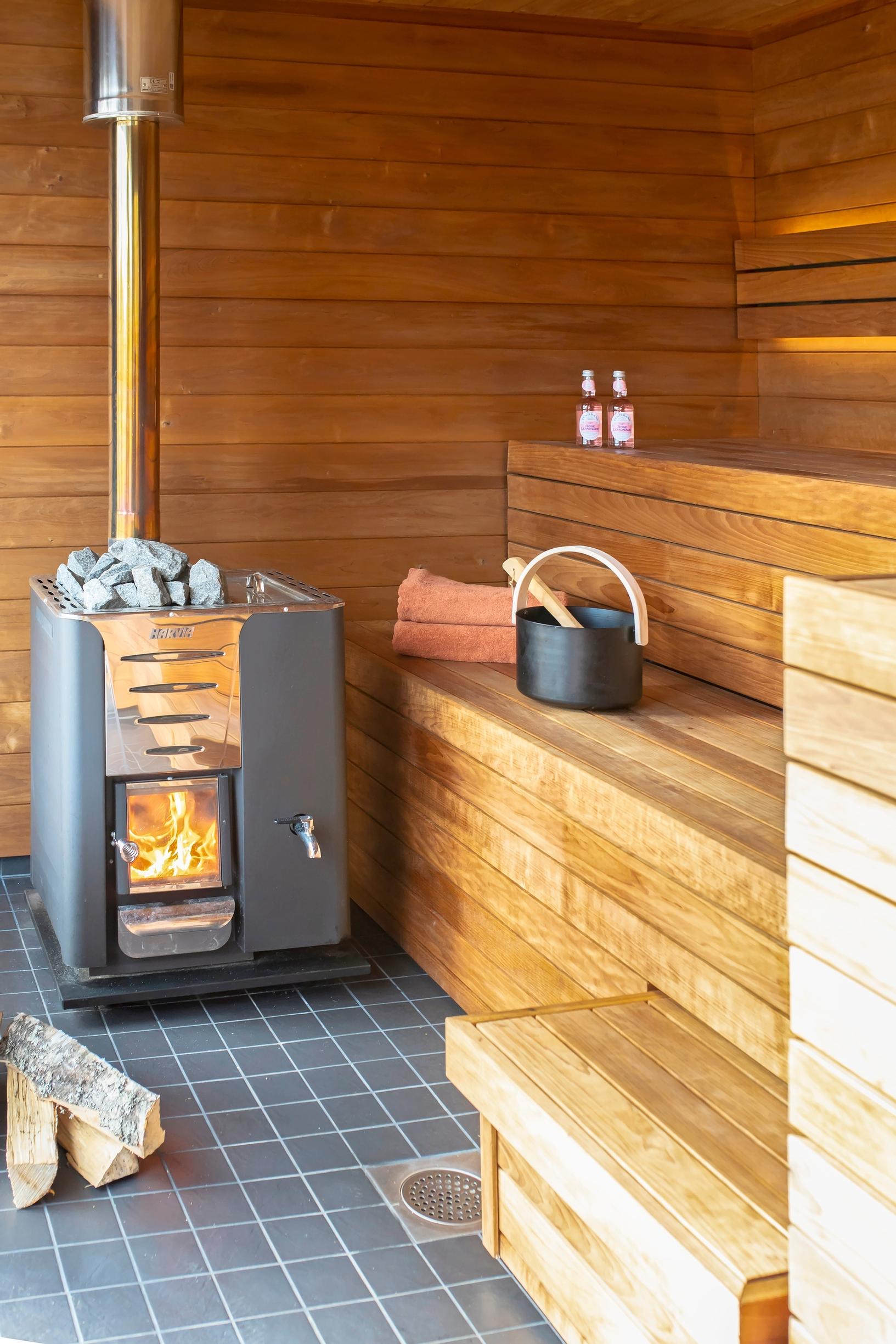 A sauna with a wood-burning stove