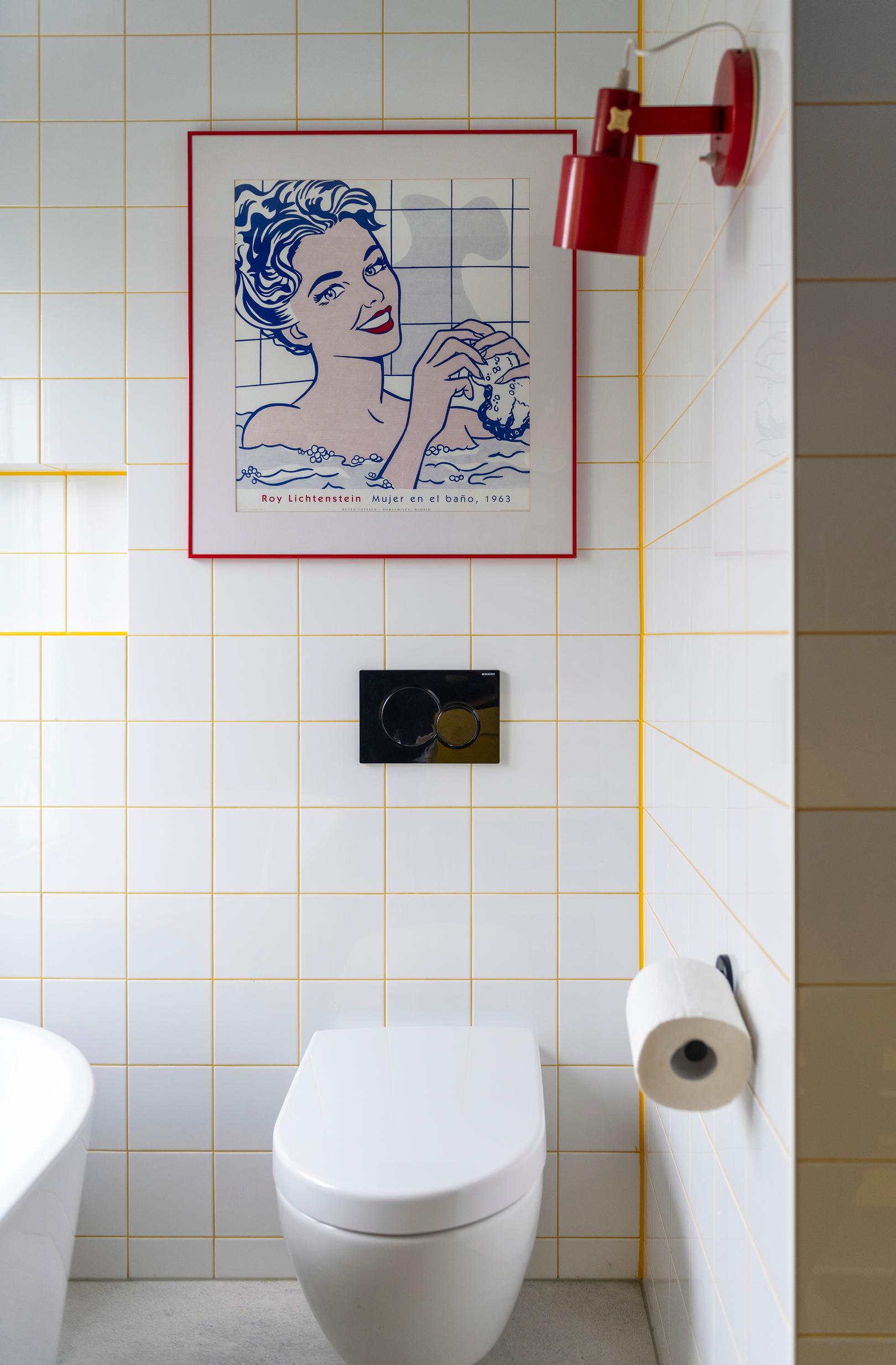 Yellow grout paired with white wall tiles