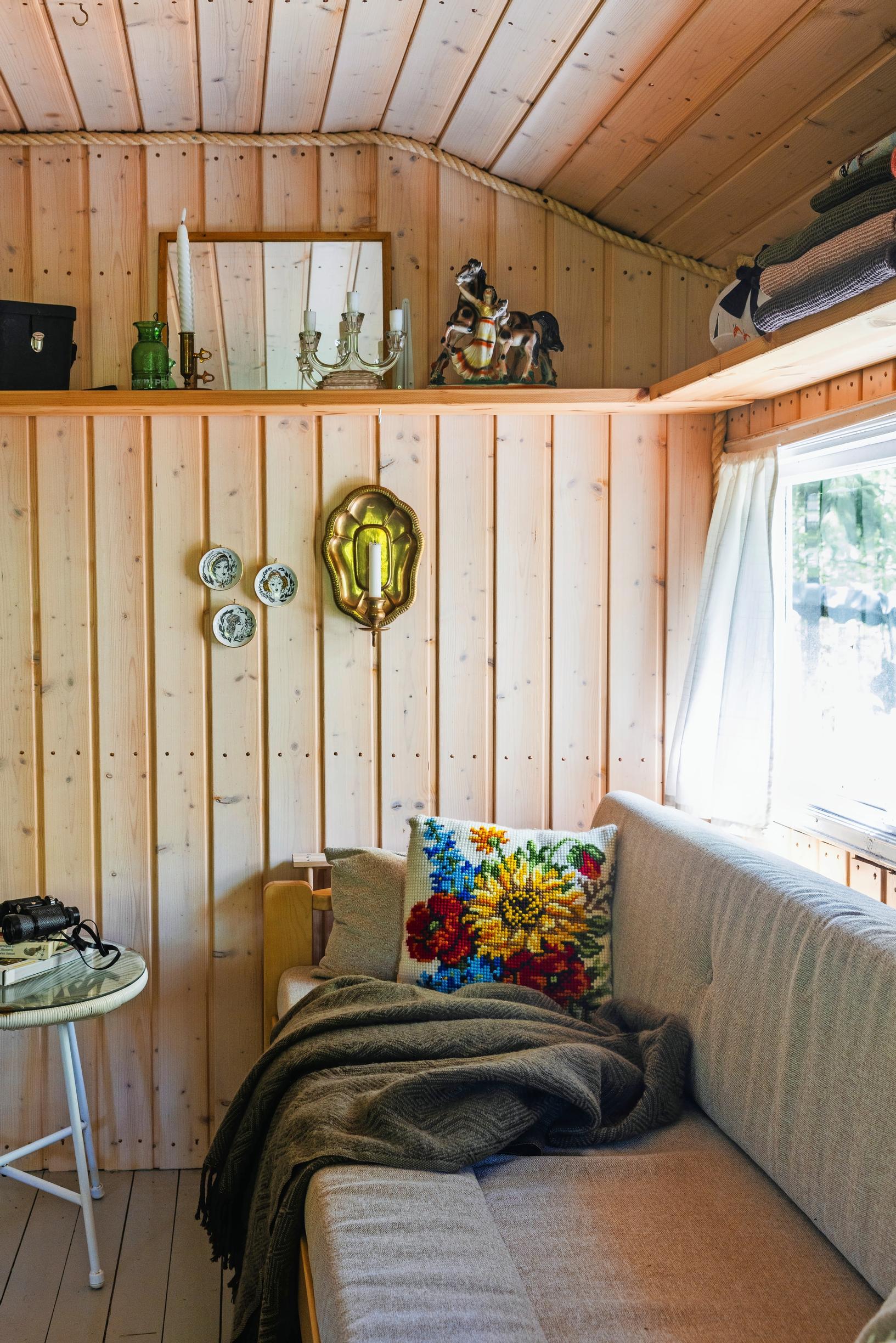a sofa, window, and shelf