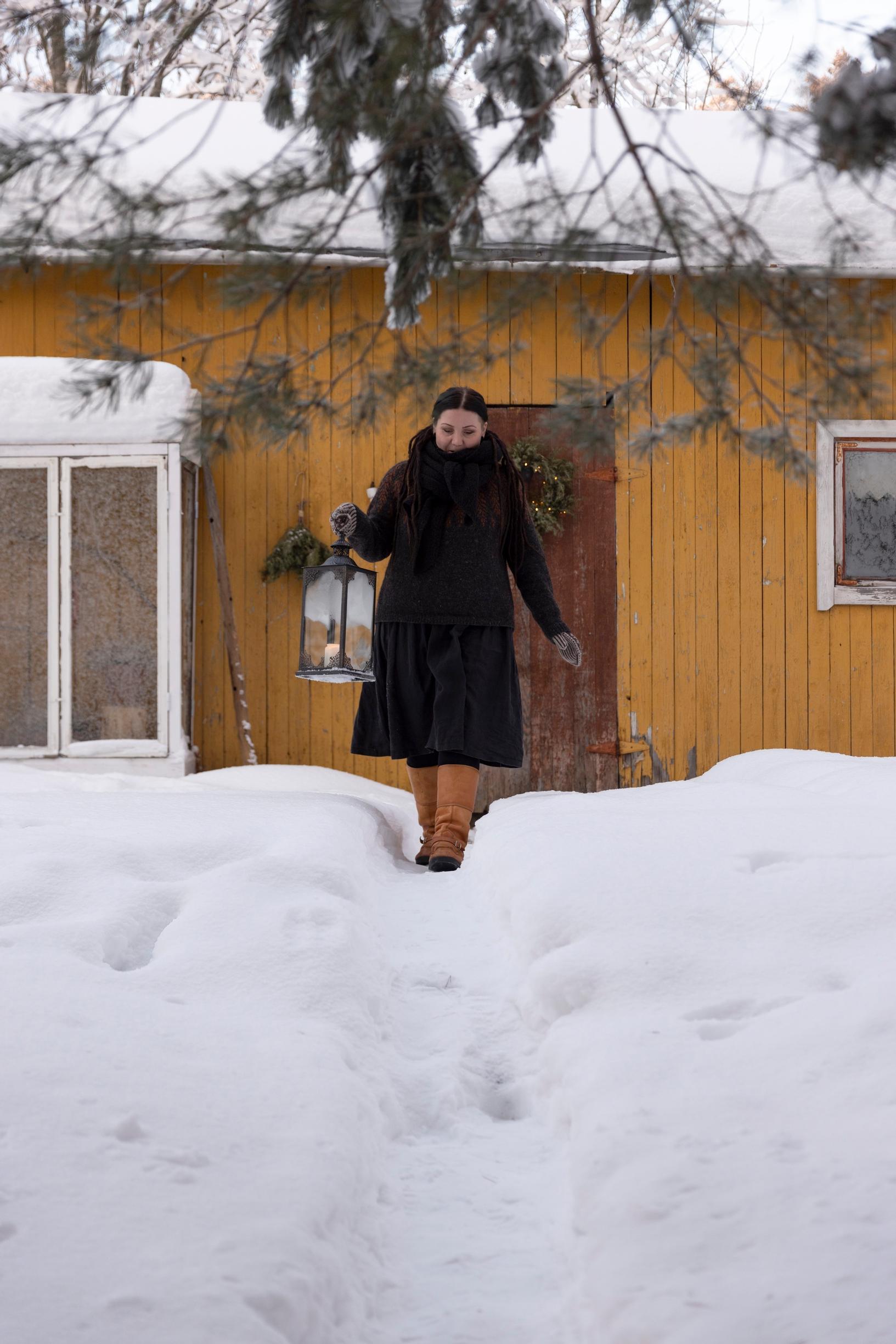 Jenna Pigg in front of her house