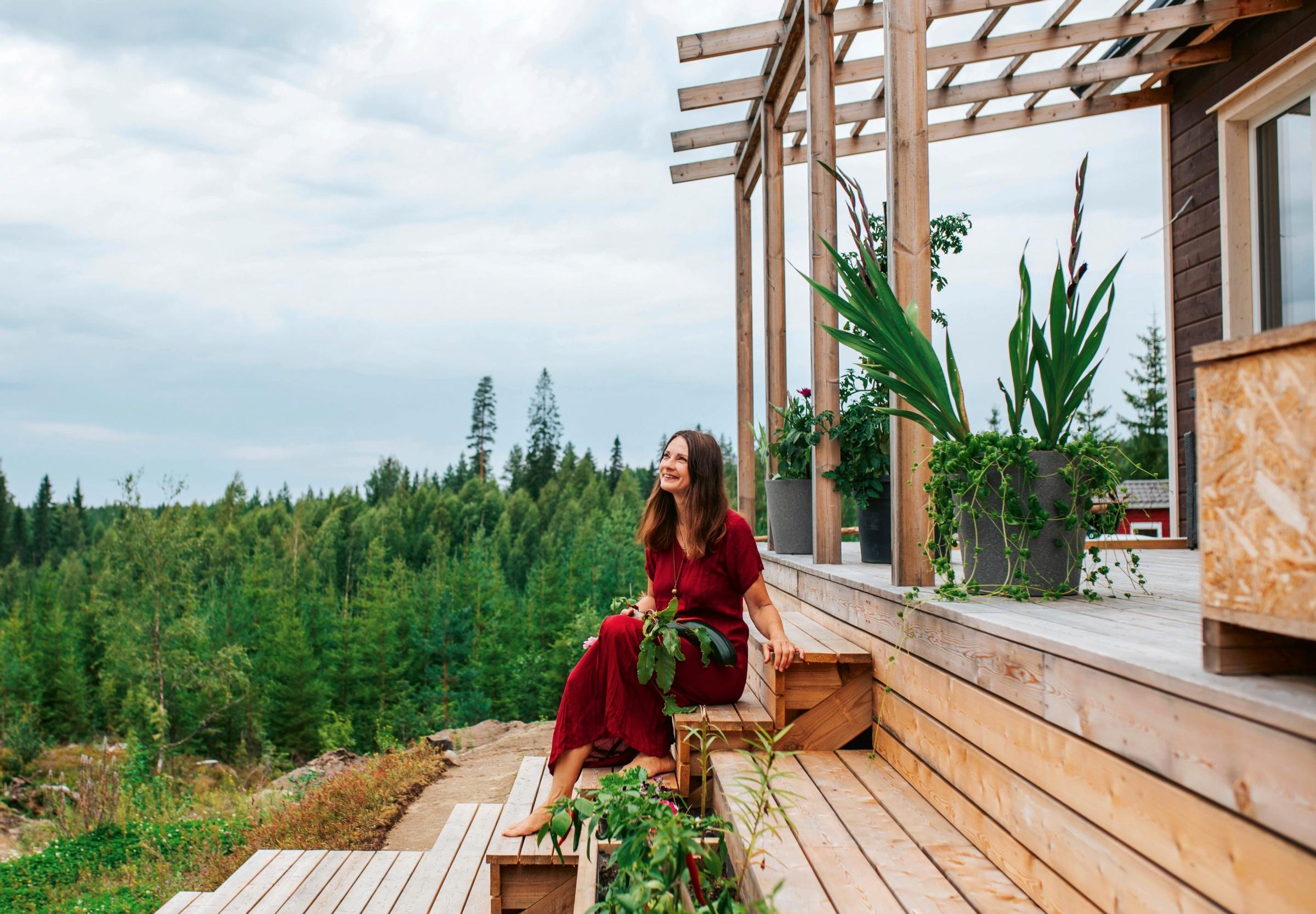 Kirsi Salo on the steps of her home