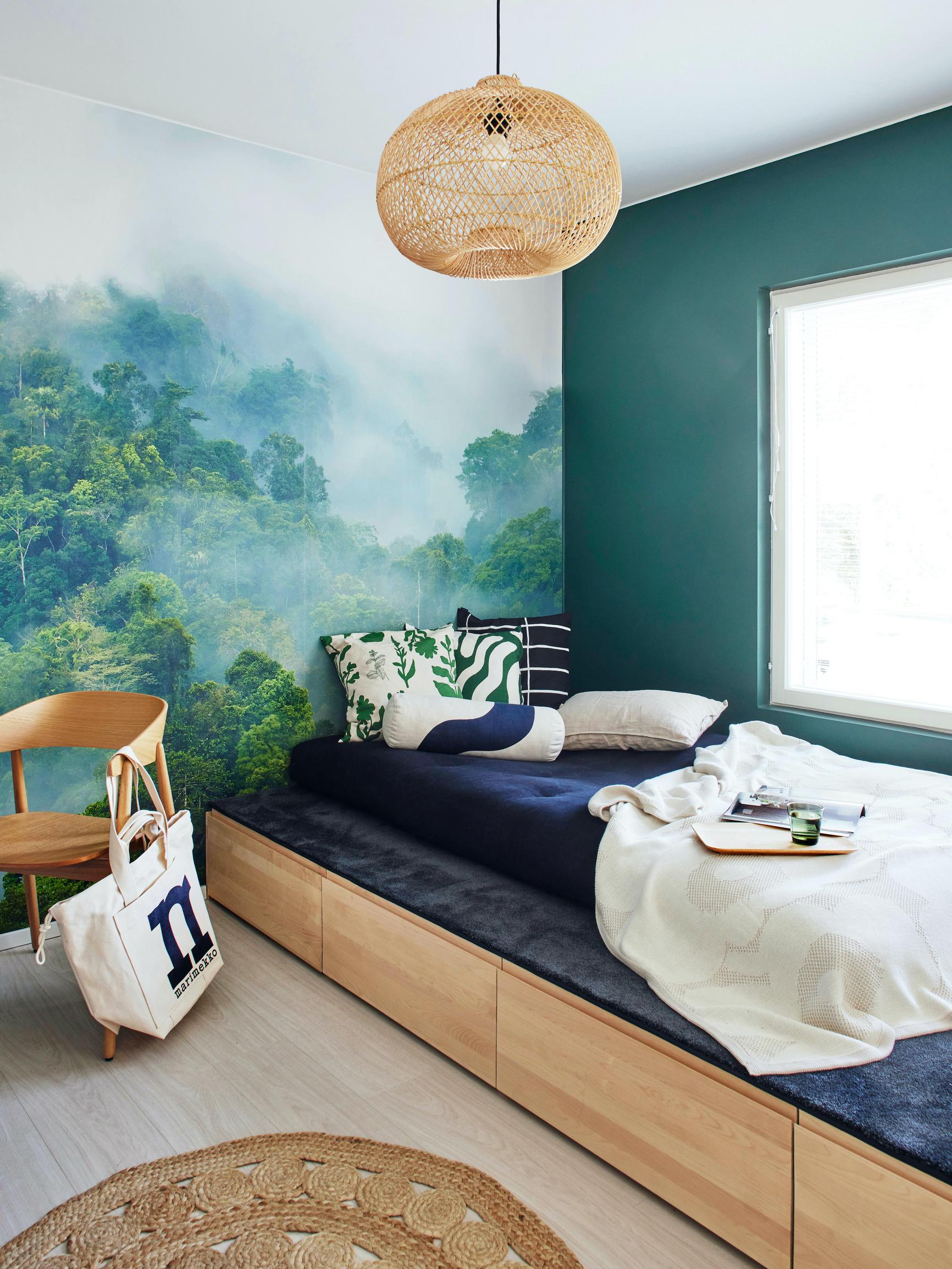 Ingenious multifunctional furniture: this space-saving sleeping platform serves as a guest bed, a lounge spot, and storage drawers