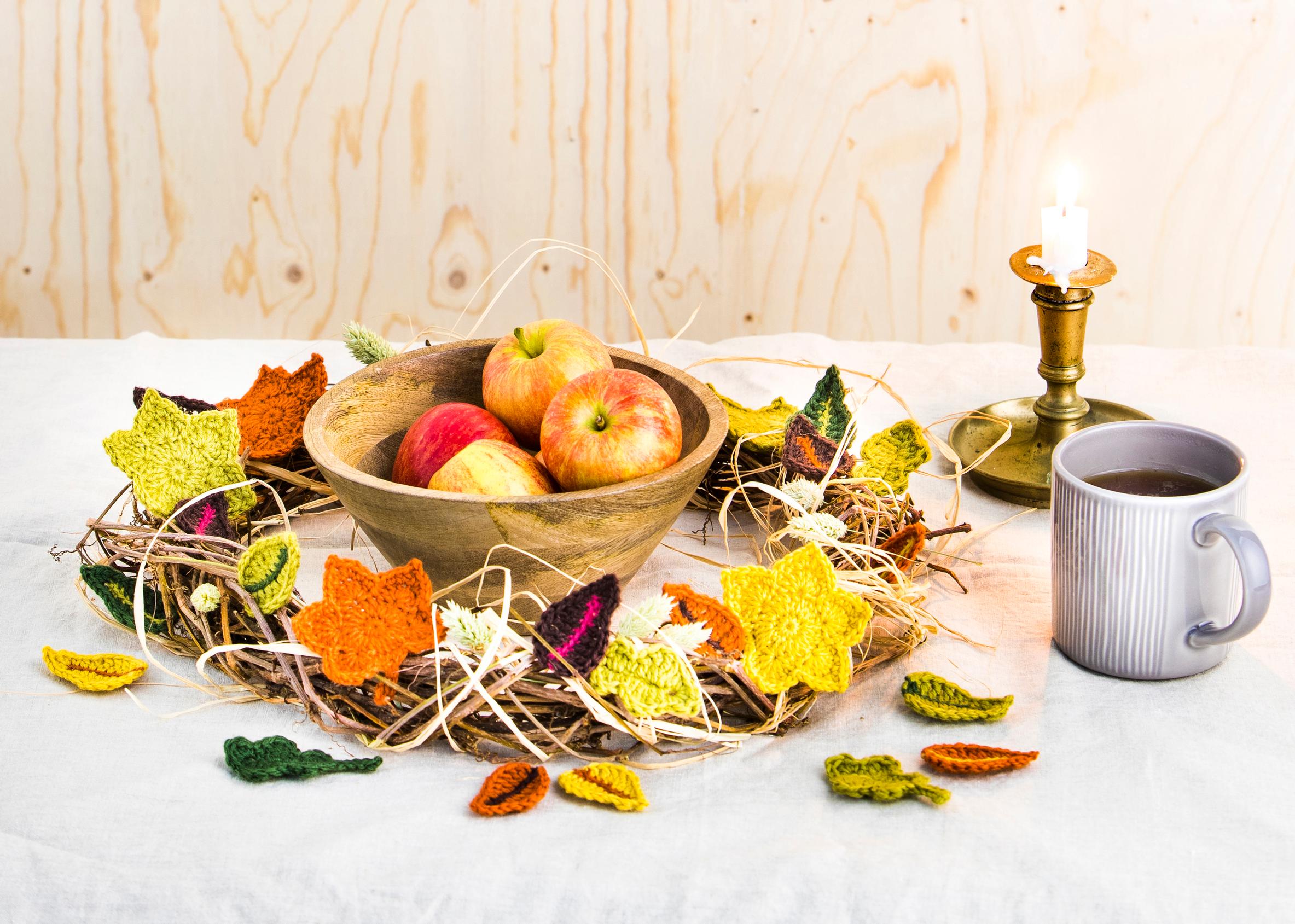 Autumn wreath decorated with crocheted leaves