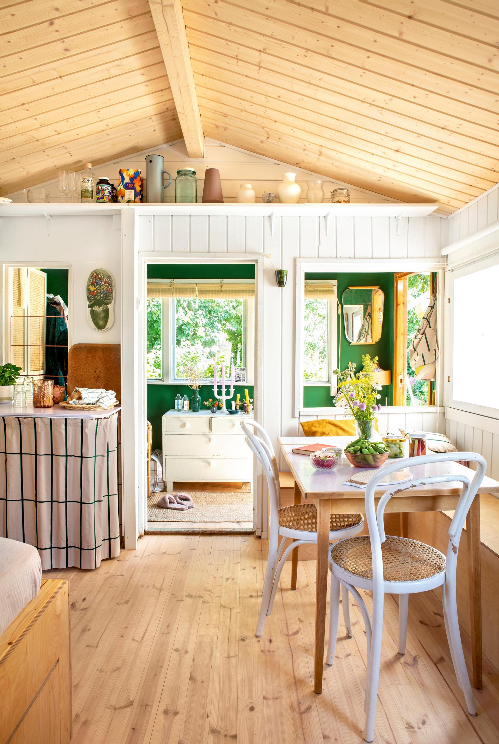 View from the living area of the community garden cottage to the porch
