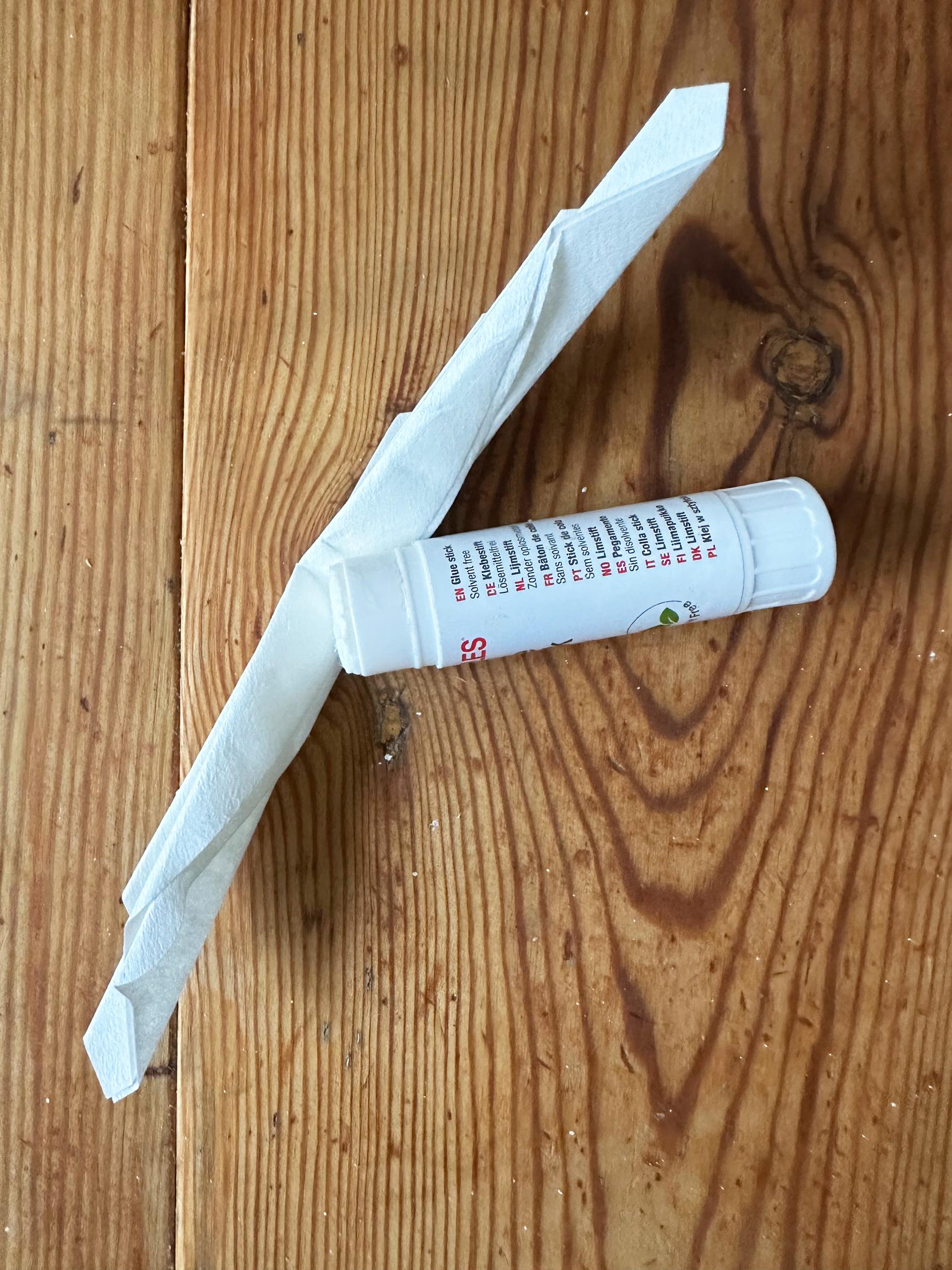 Gluing the coffee filter accordions.