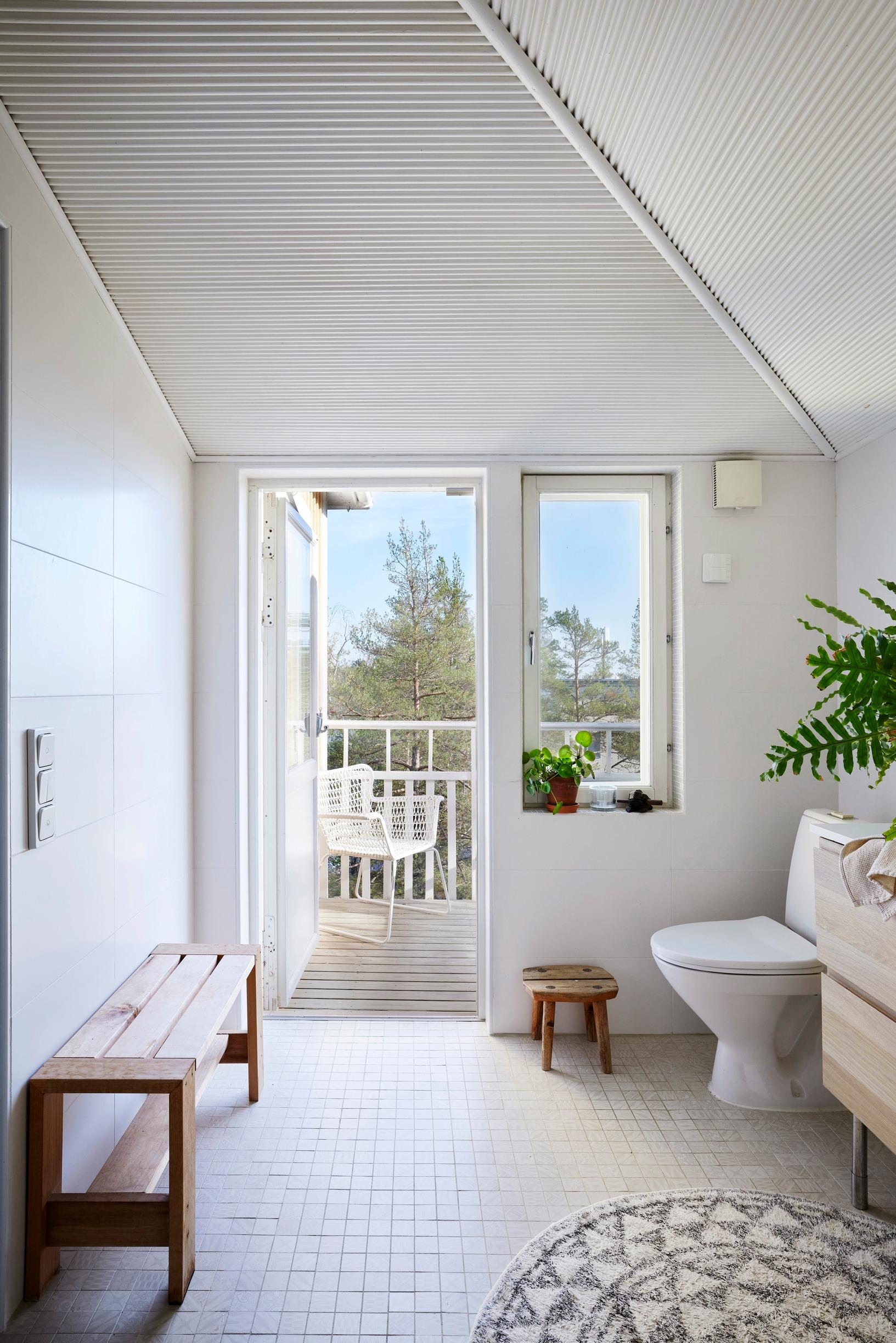 A slanted-ceiling bathroom