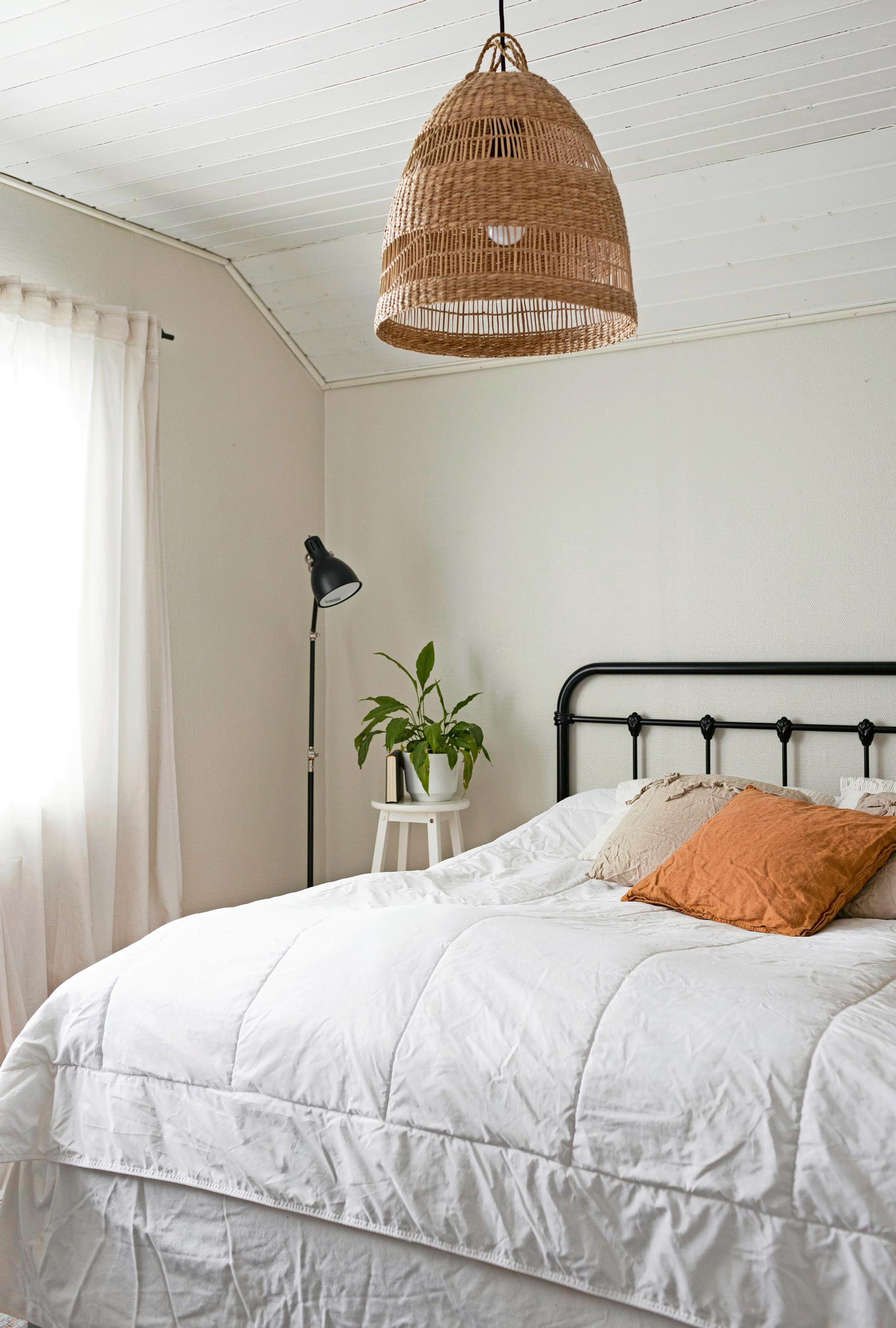 Black headboard in the bedroom