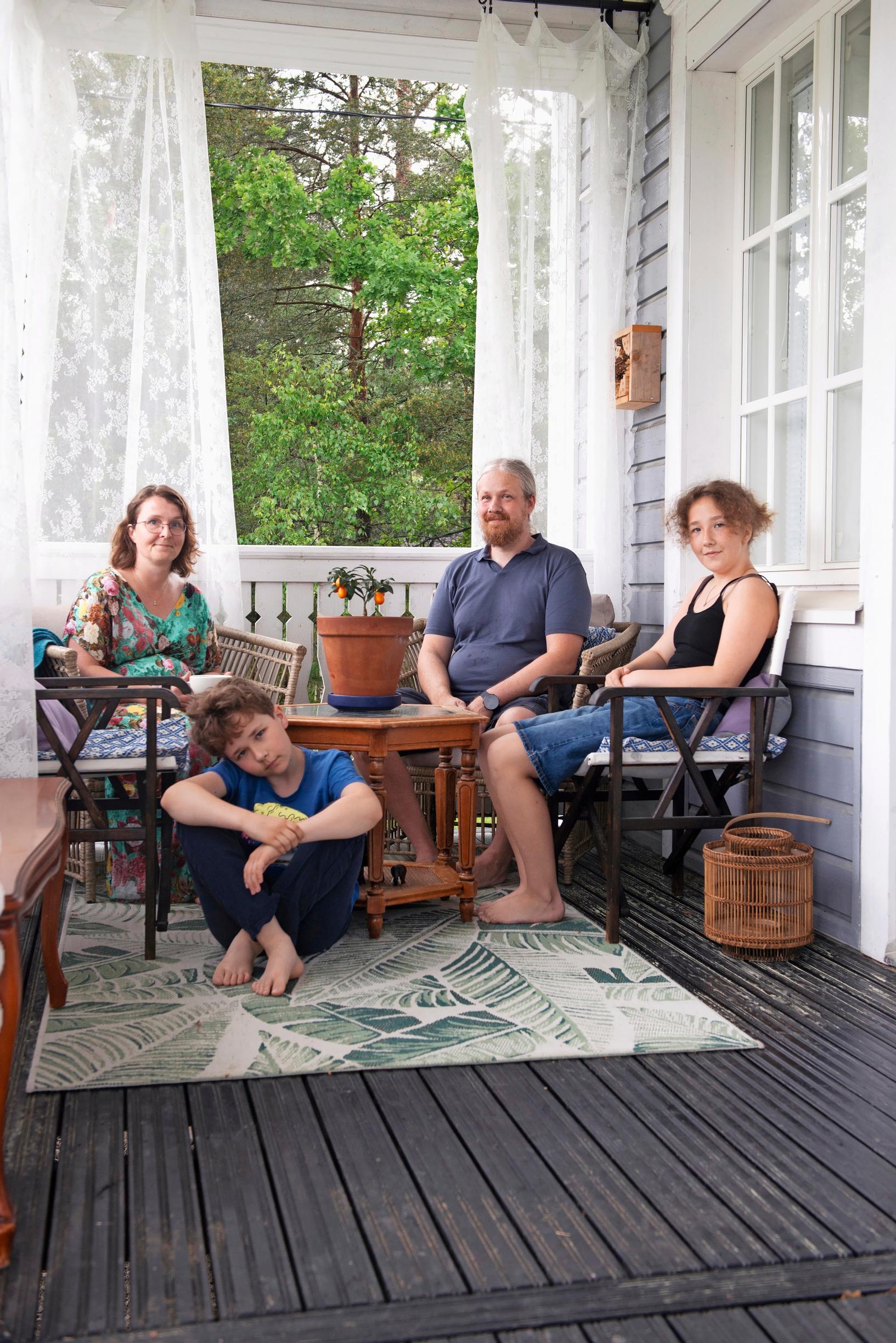 The Jokela family on the porch