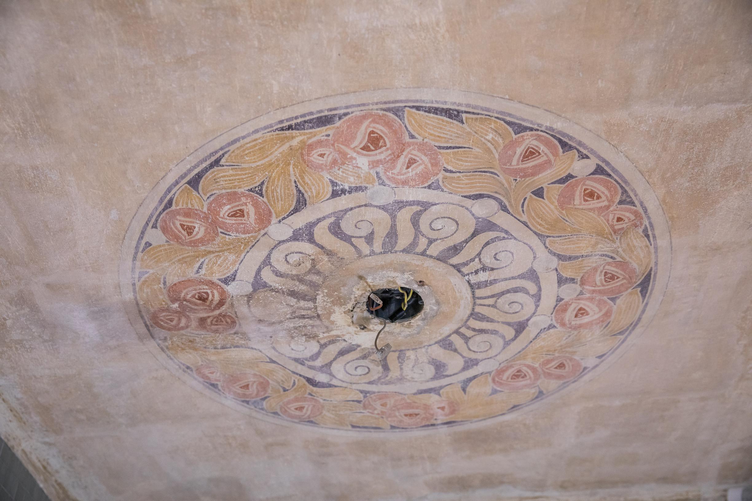 An old decorative painting on the ceiling