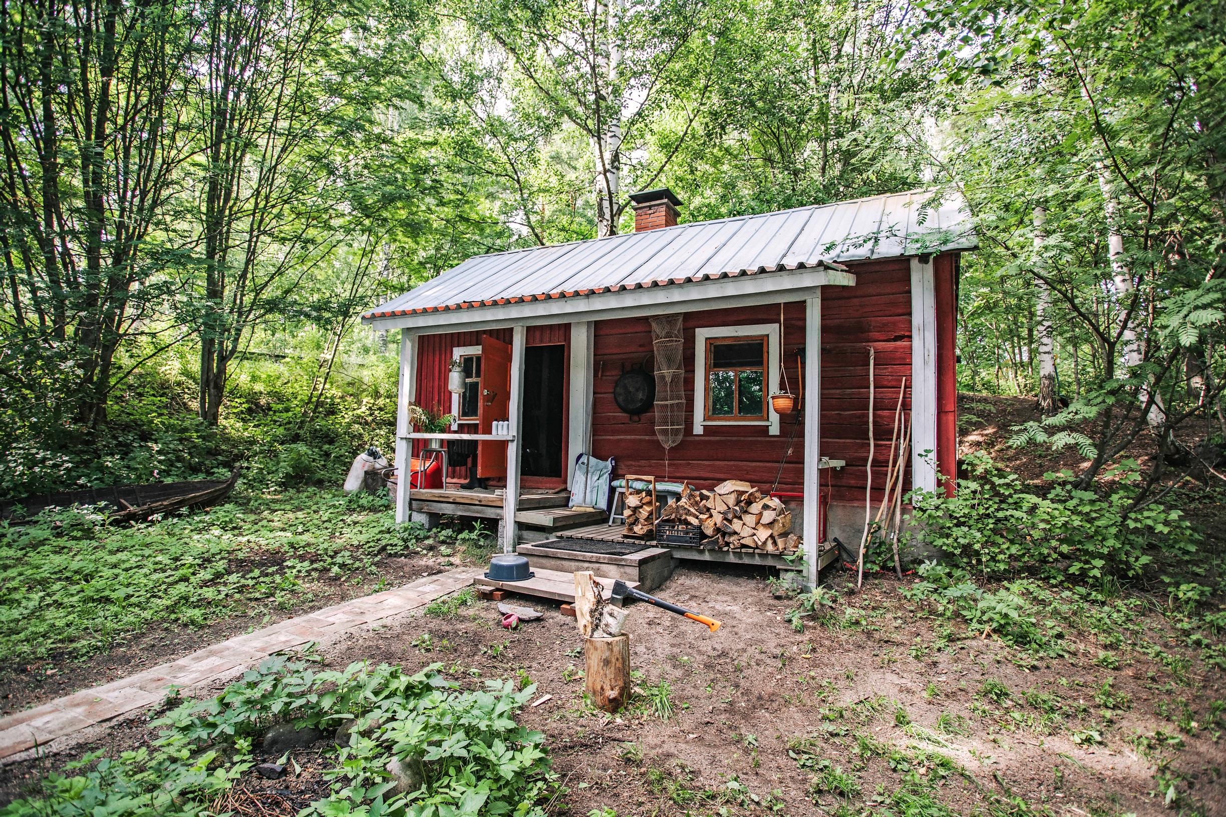 Red lakeside sauna