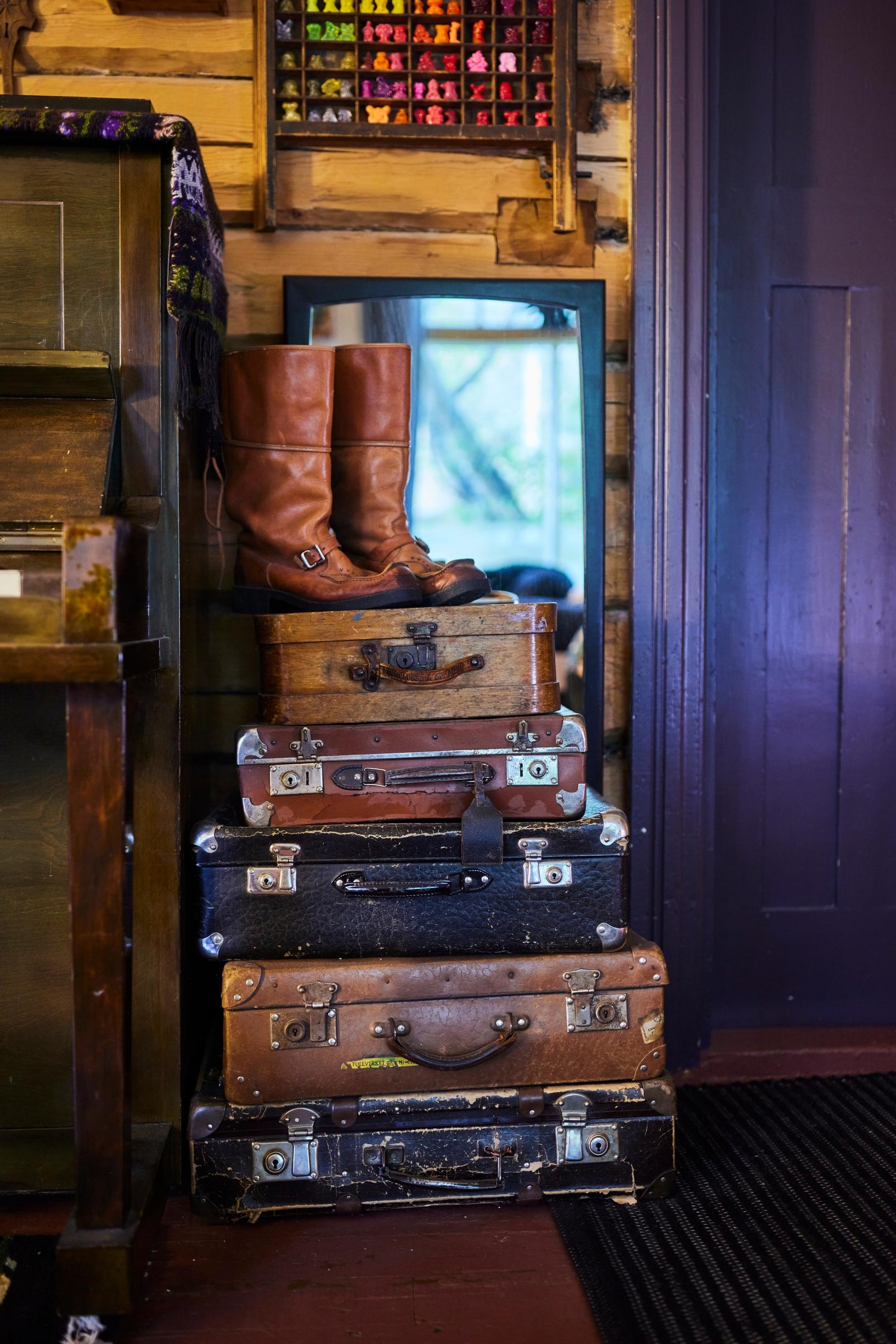 Stack of old suitcases as storage space