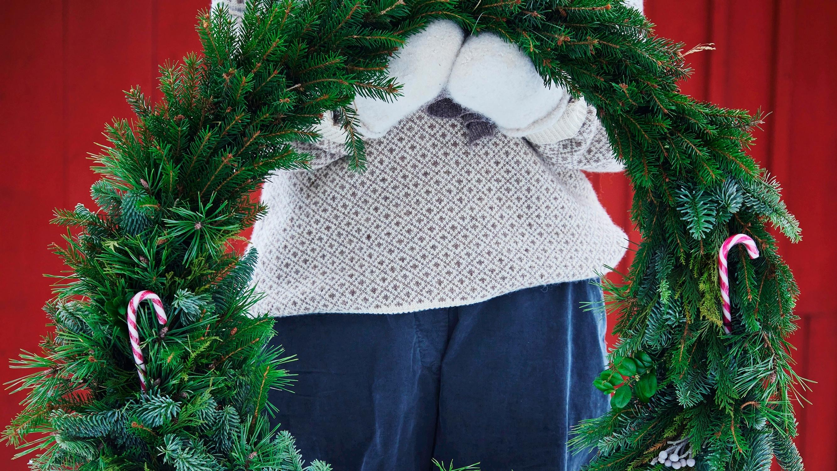 Make a giant wreath to brighten your yard all winter—here’s how