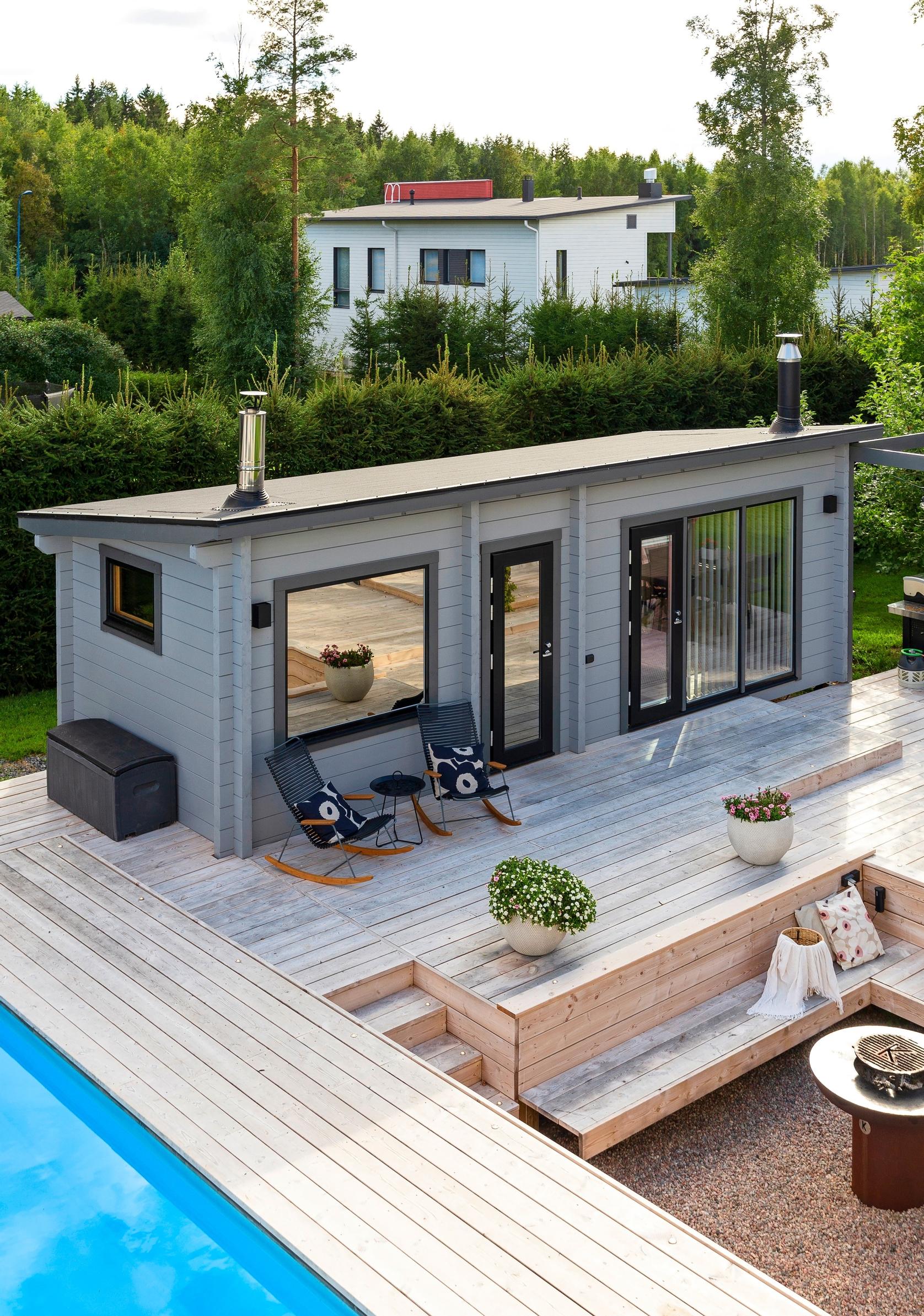 Outdoor sauna building alongside the deck