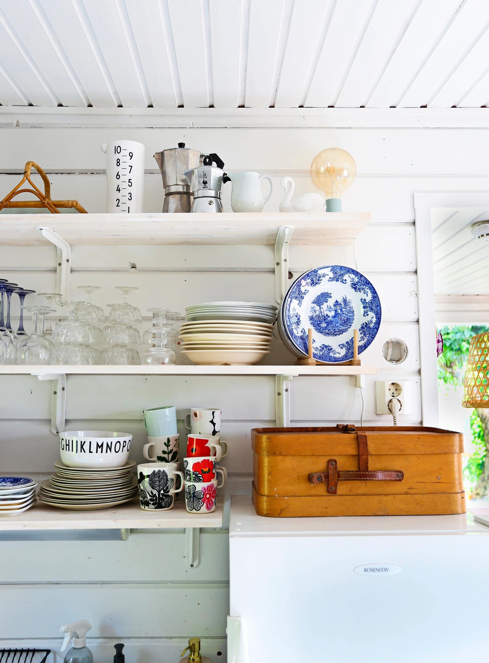 Open shelves in the small cottage kitchen